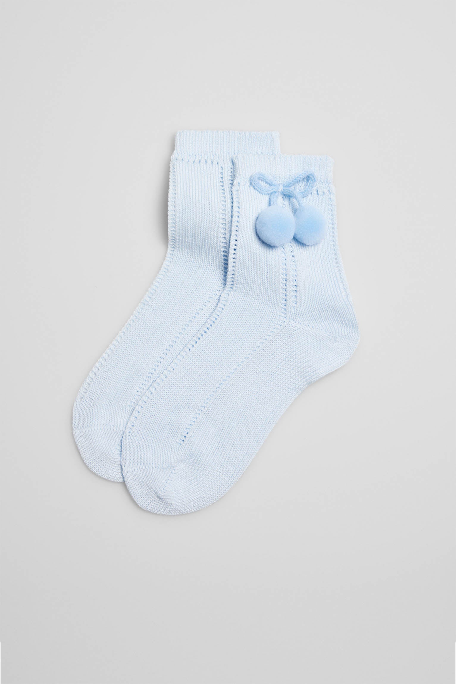 Calcetines calados infantiles celeste