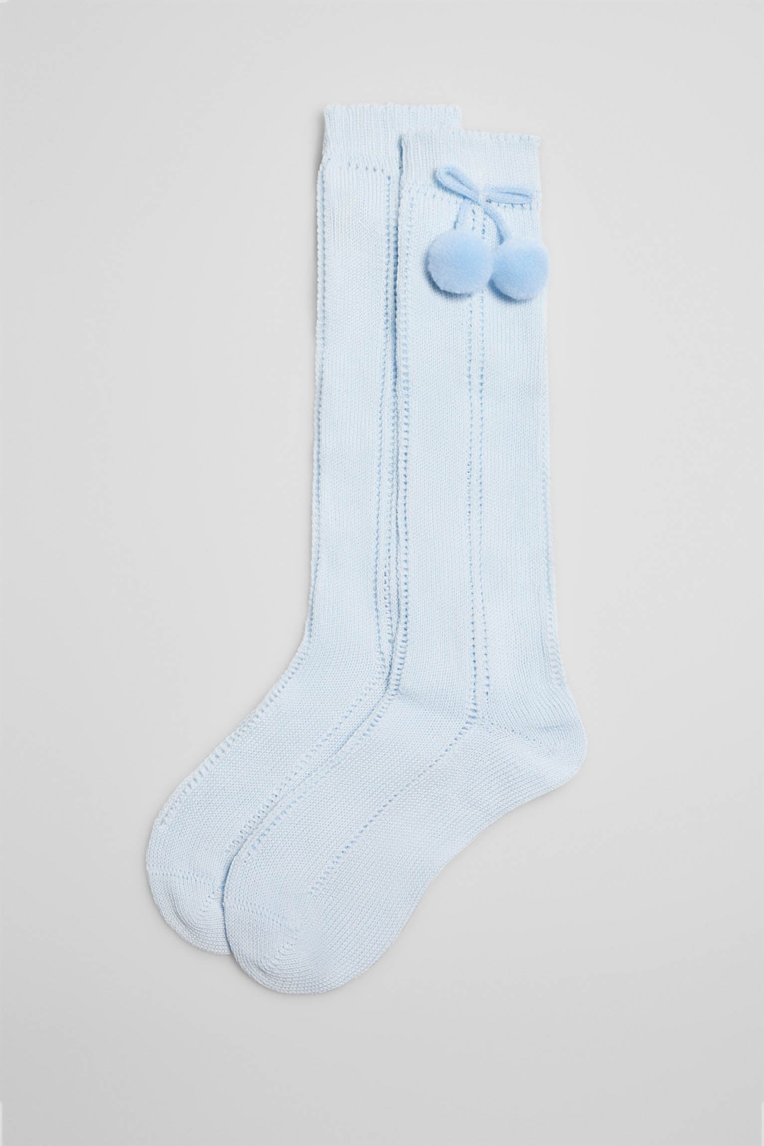 Calcetines calados largos infantiles celeste