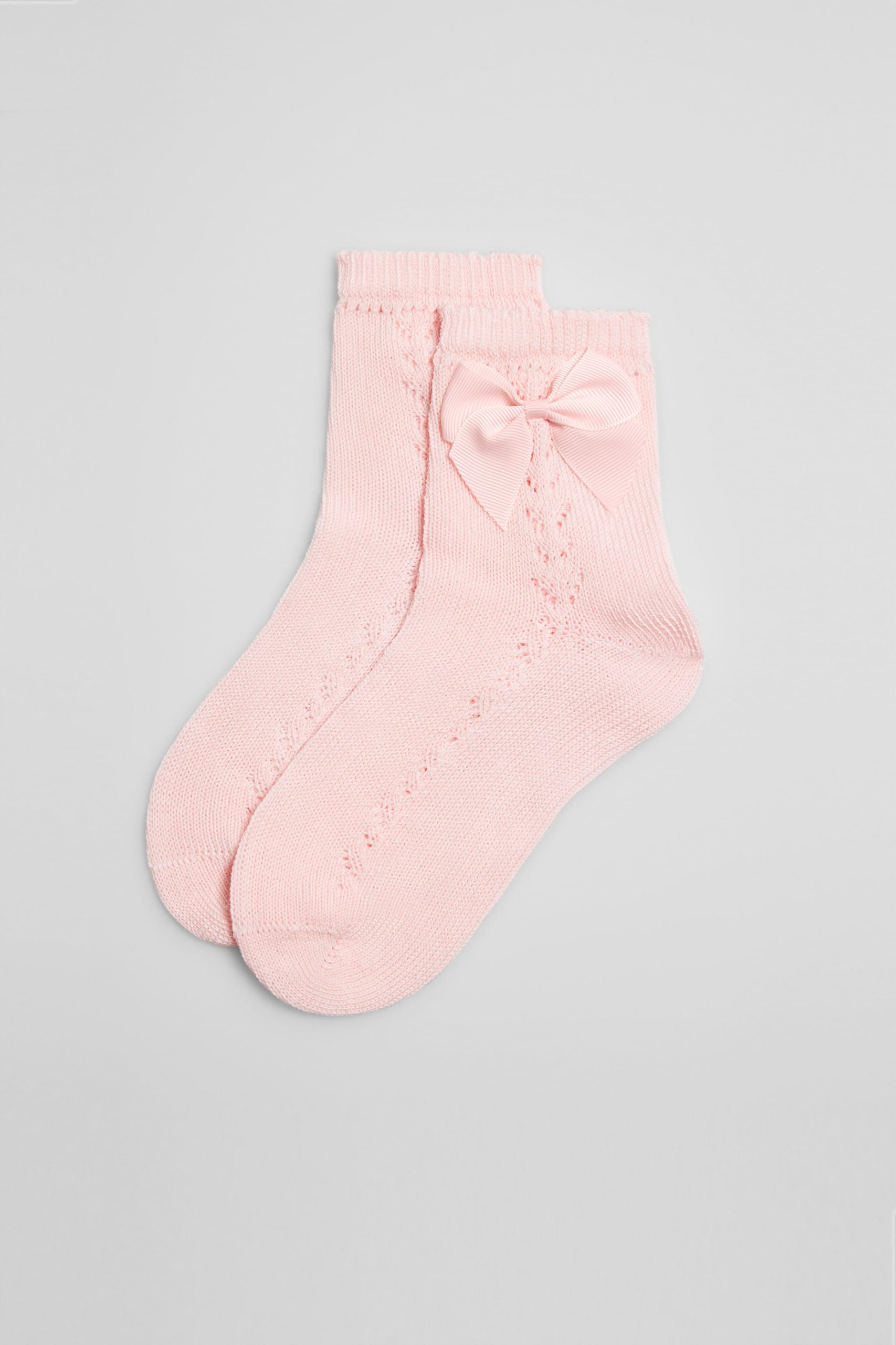 Calcetines calados infantiles rosa