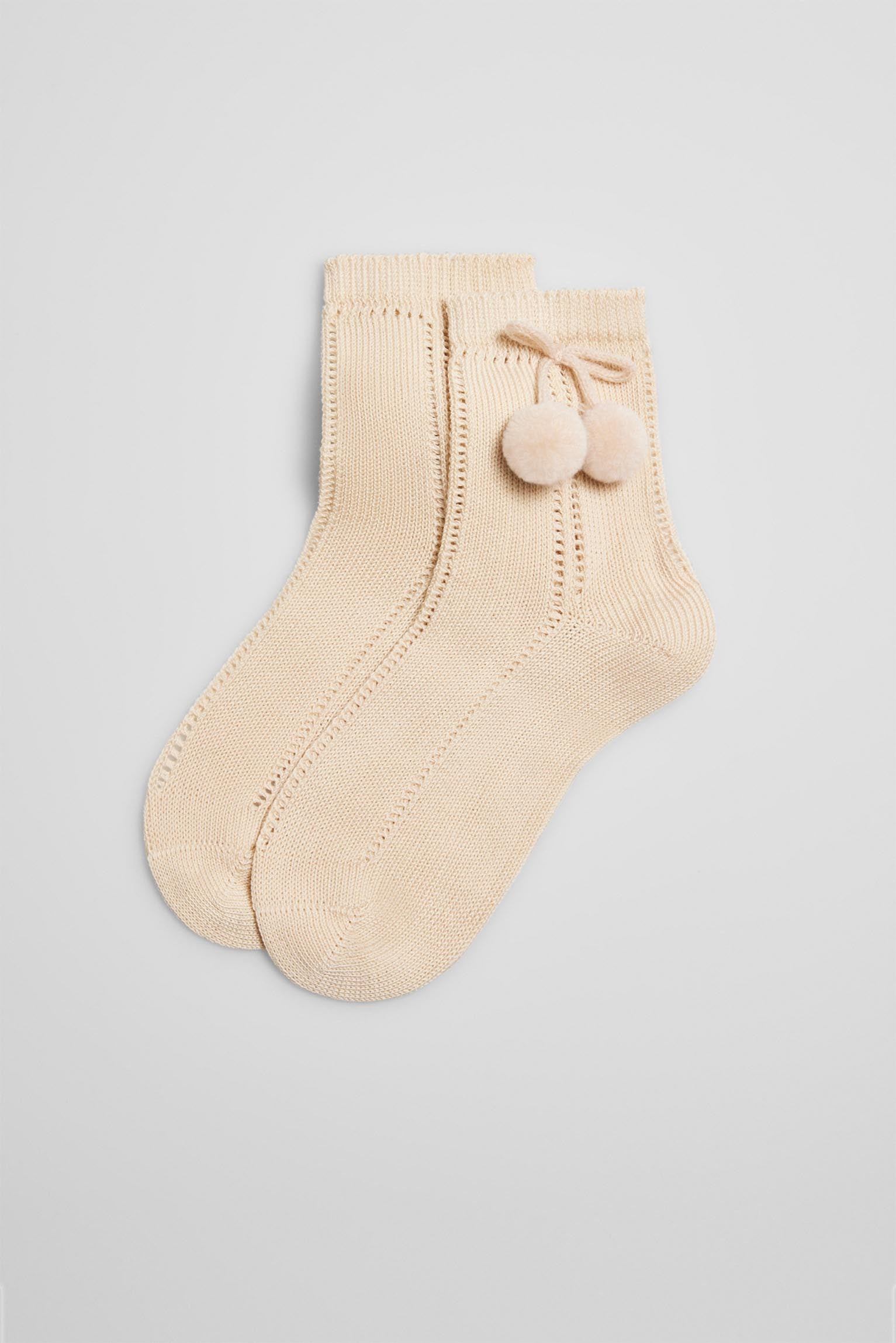 Calcetines calados infantiles beige