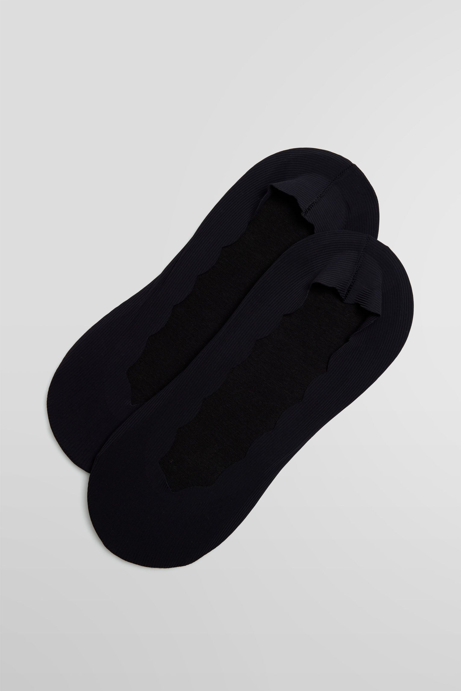 Pinkies invisibles de algodón lisos con banda de silicona en negro