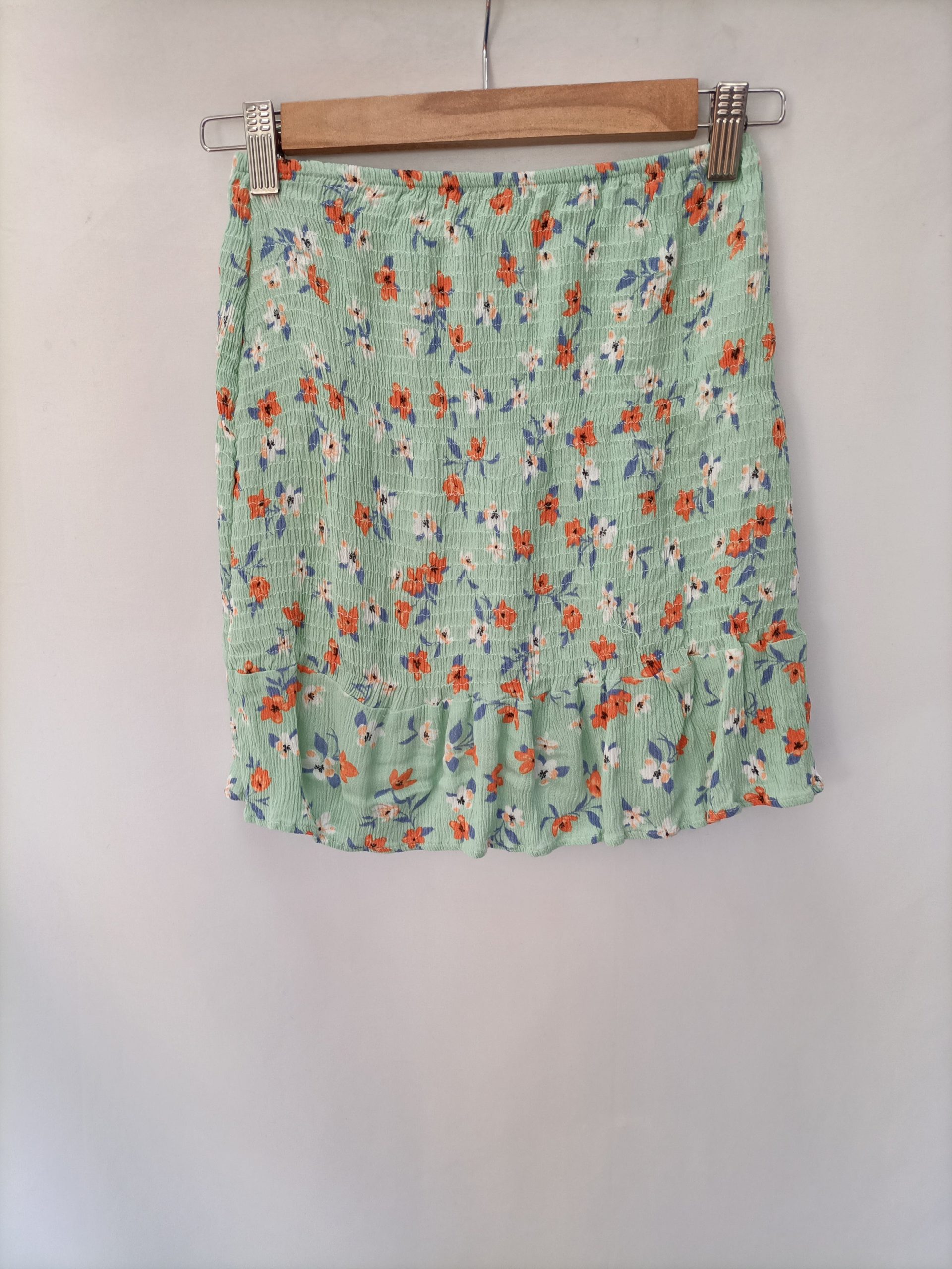 PULL&BEAR. Falda corta flores T.s