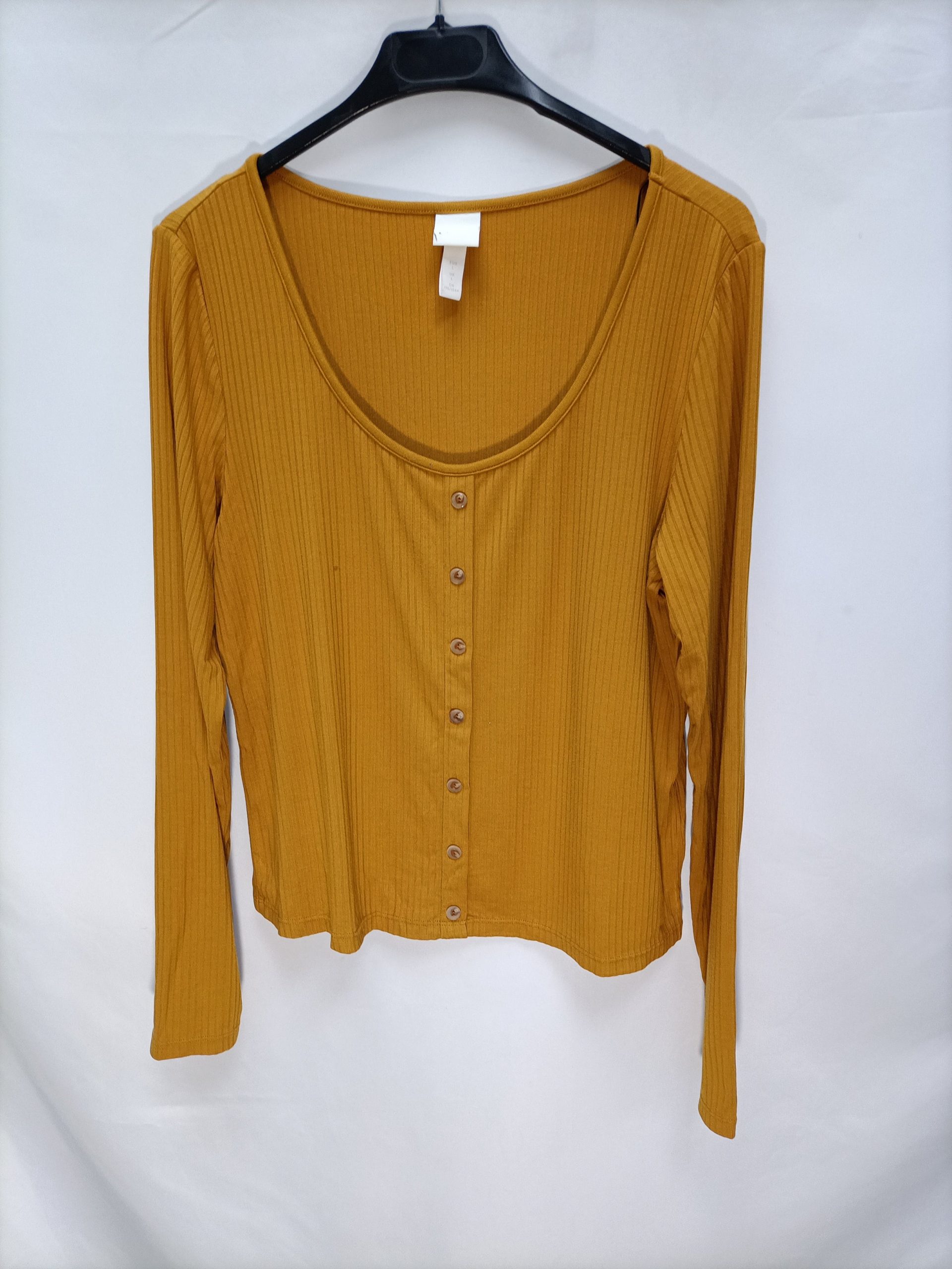 H&M. Camisetaostaza canalé T.l