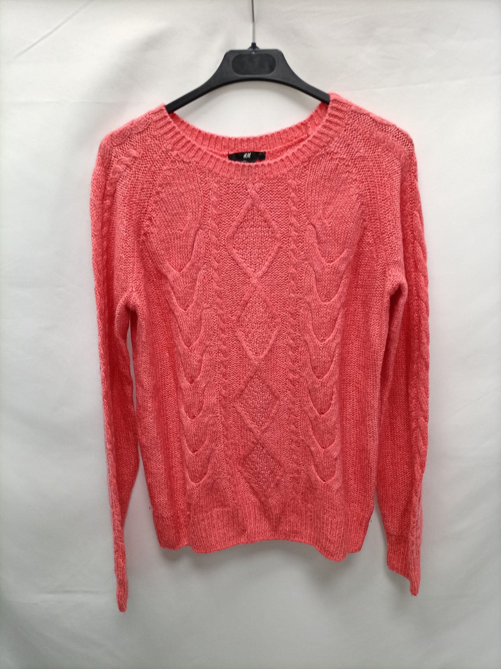H&M. Jersey rosa ochos T.s