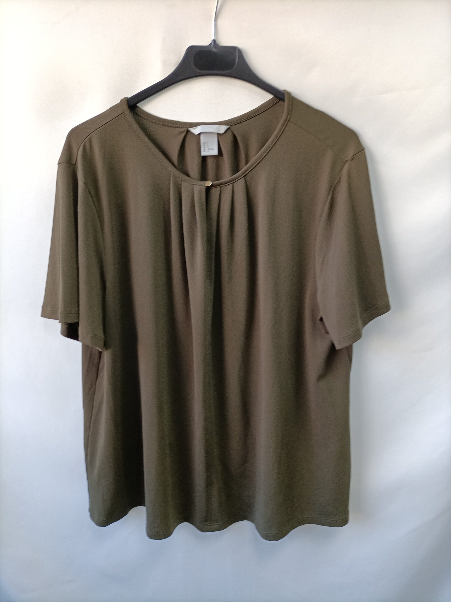 H&M. Blusa fluida verde T.l
