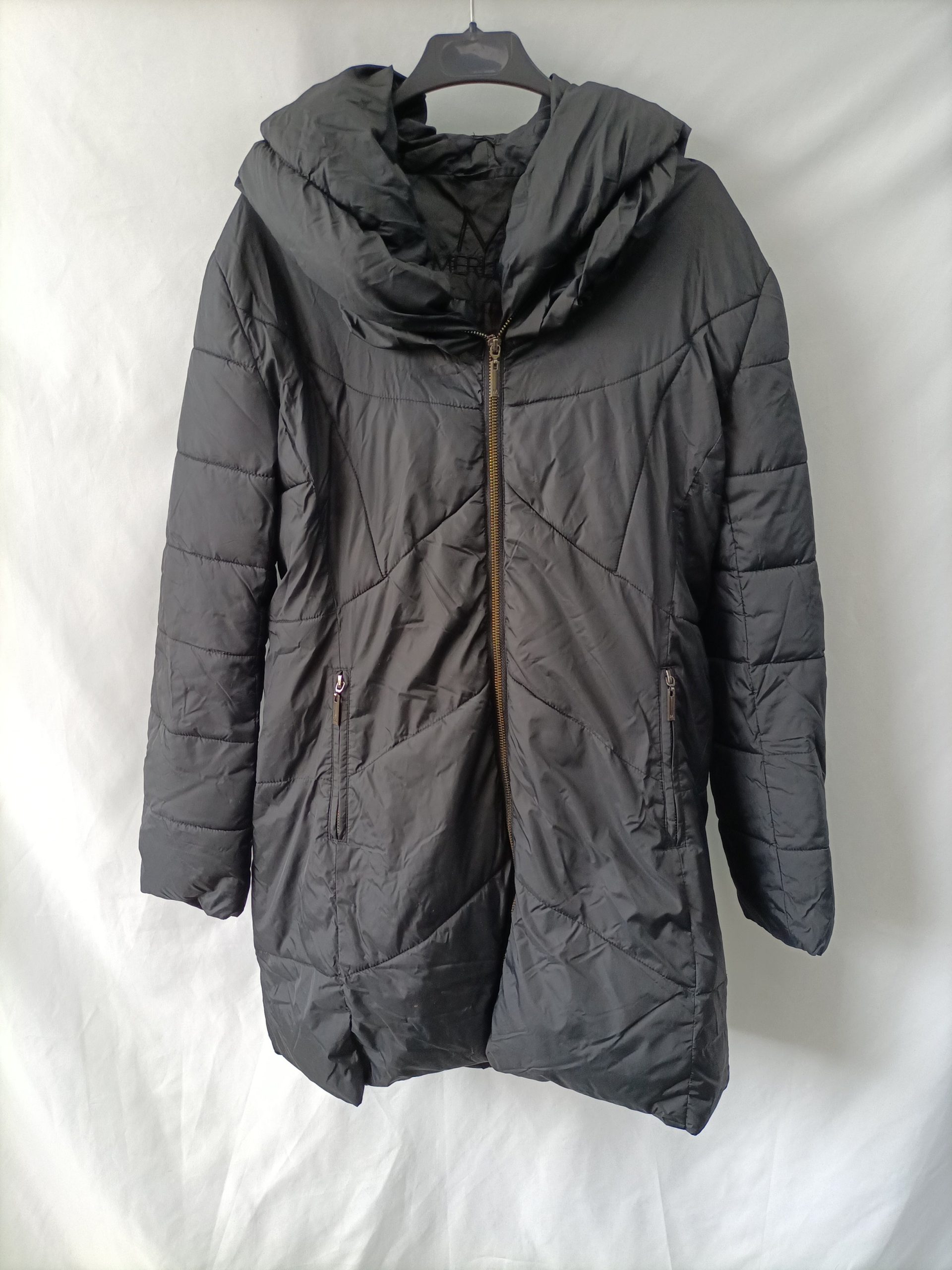 MERLETTI. plumas negro T.u(m)