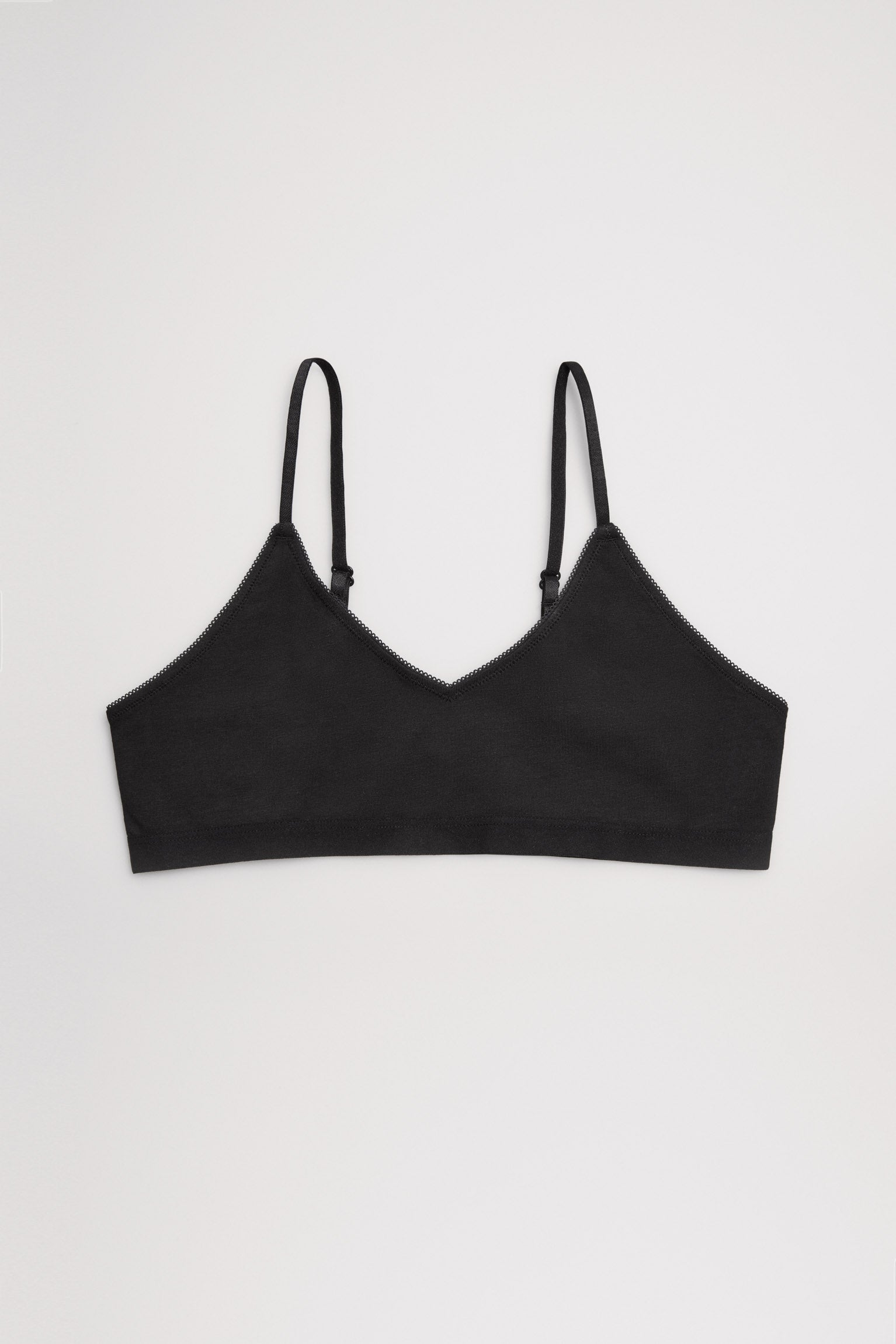 Top juvenil liso negro