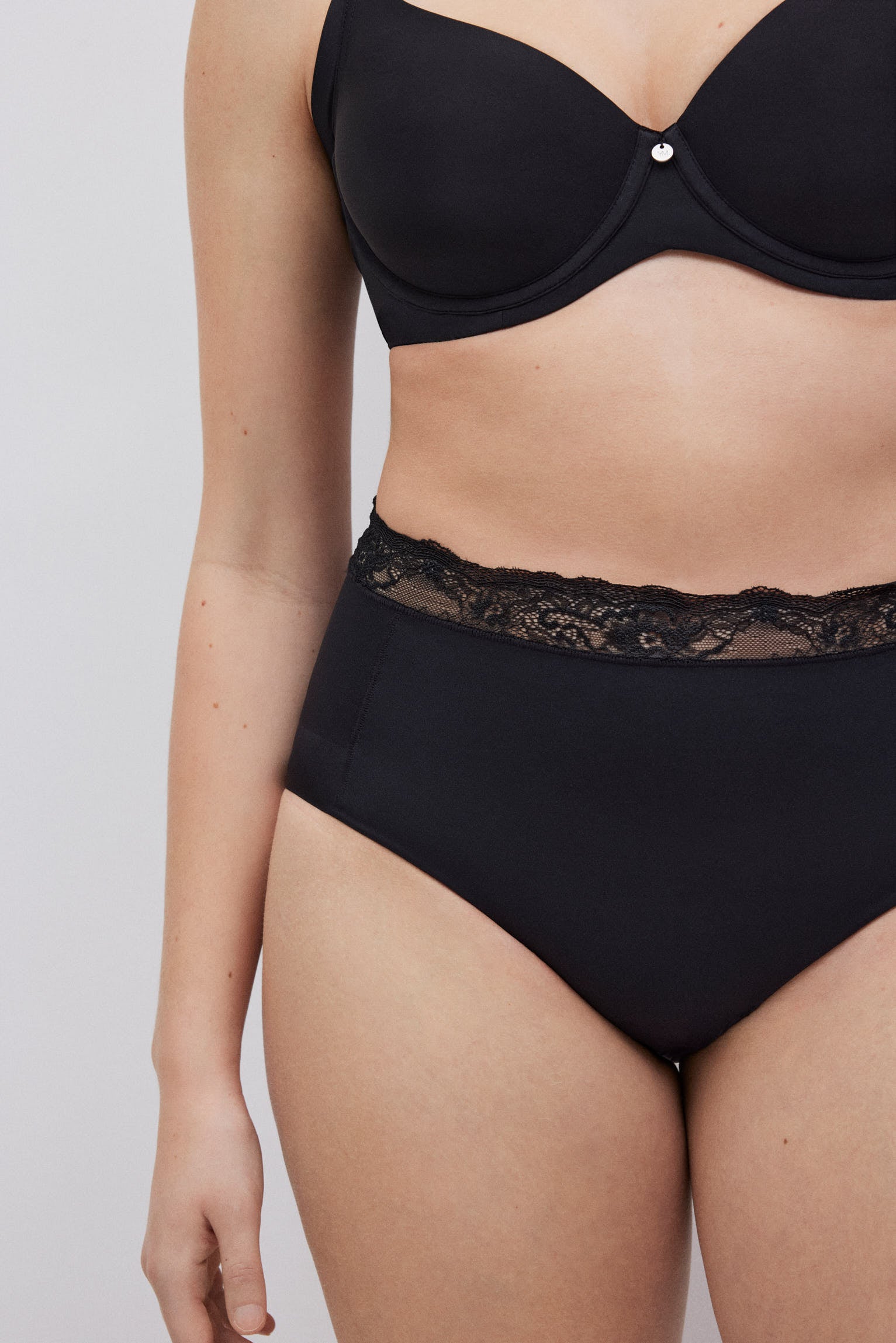 Braga reductora media compresión negro