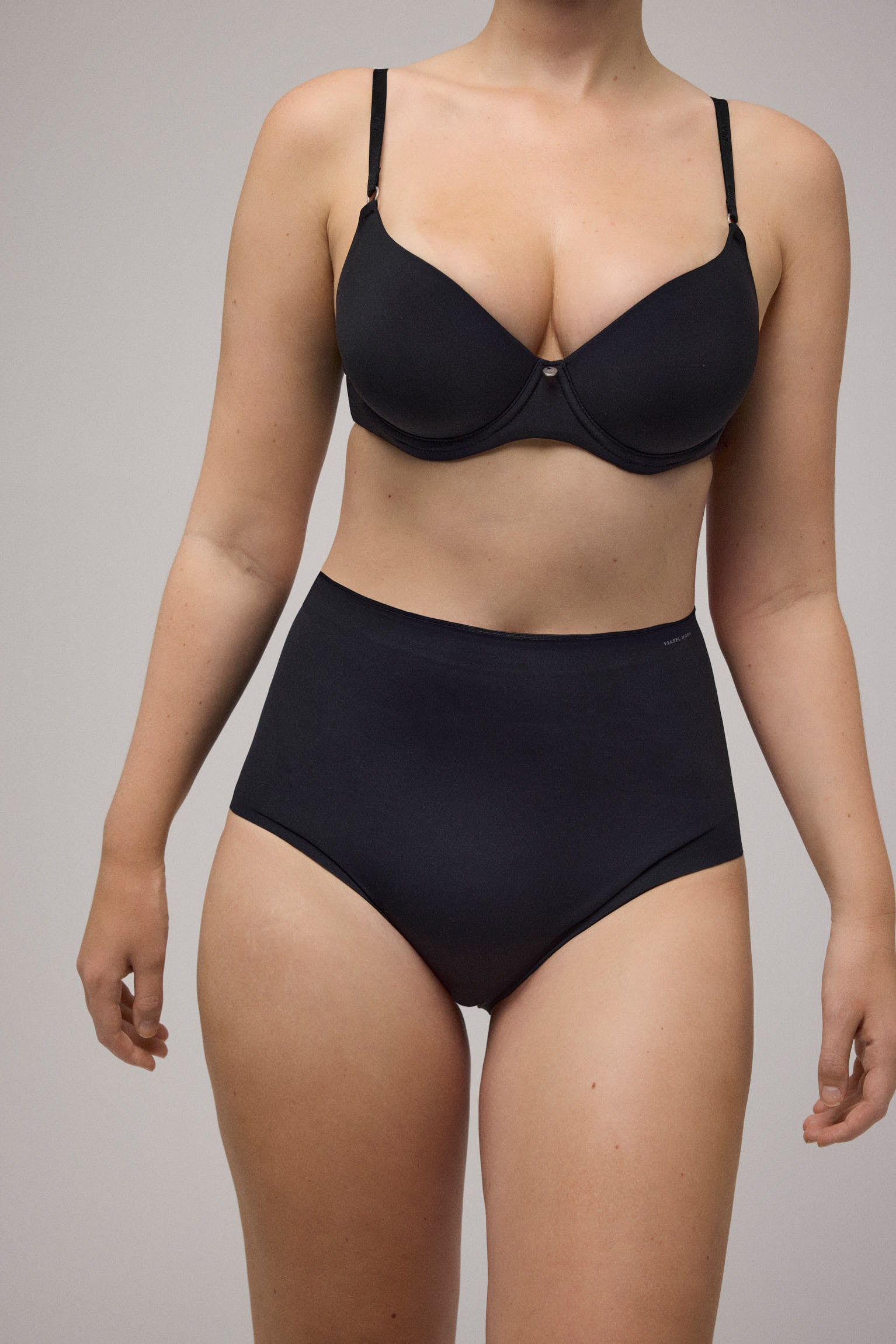 Braga reductora láser compresión media negra