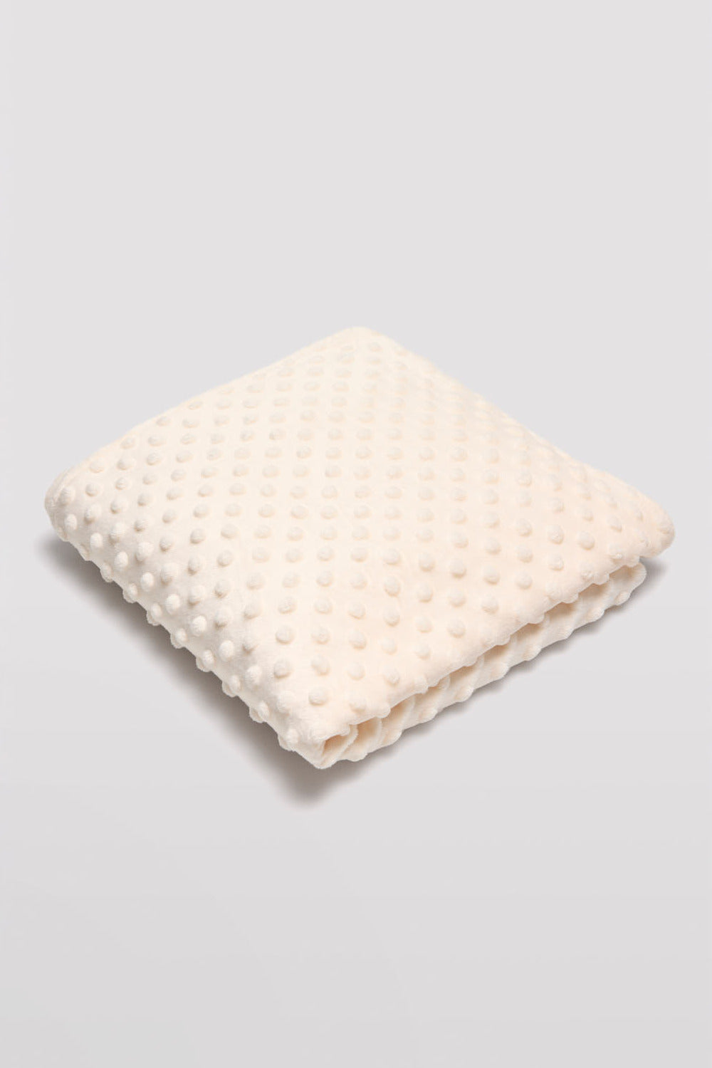 Manta de bebé topitos marfil