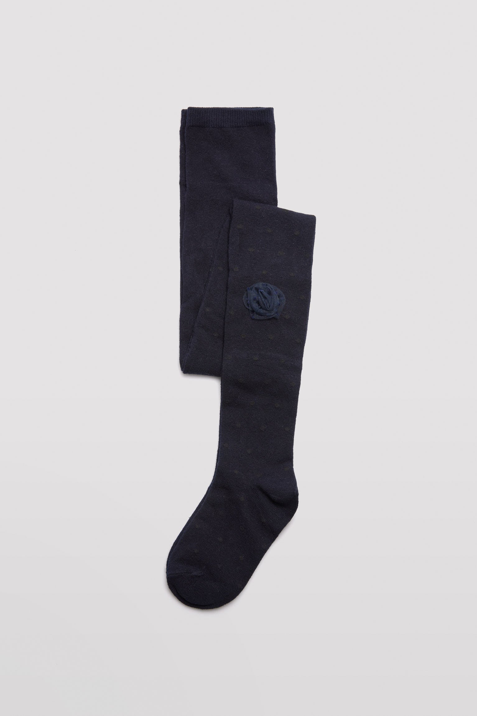 Leotardo niña detalle pompón marino