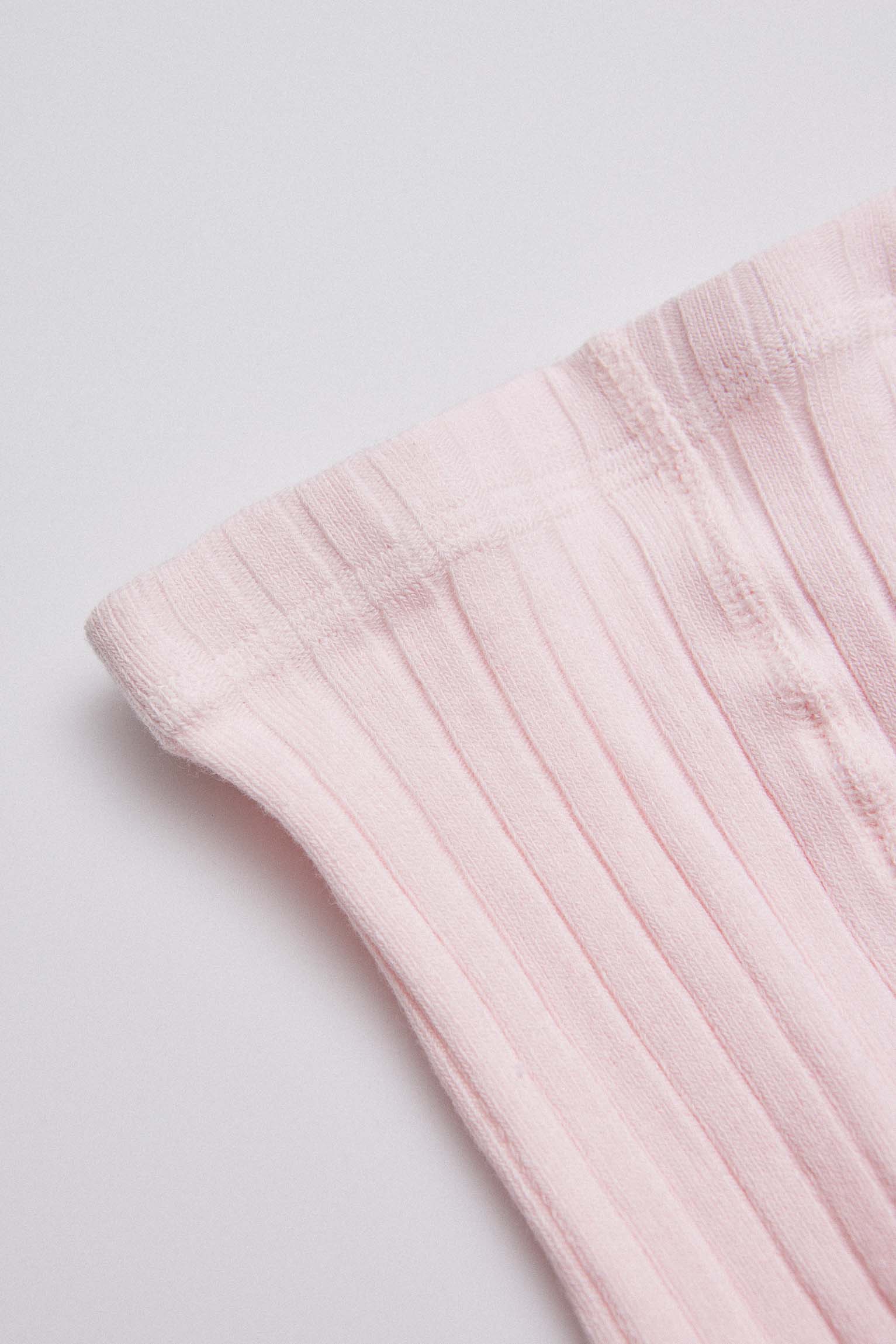 Leotardo canalé rosa palo