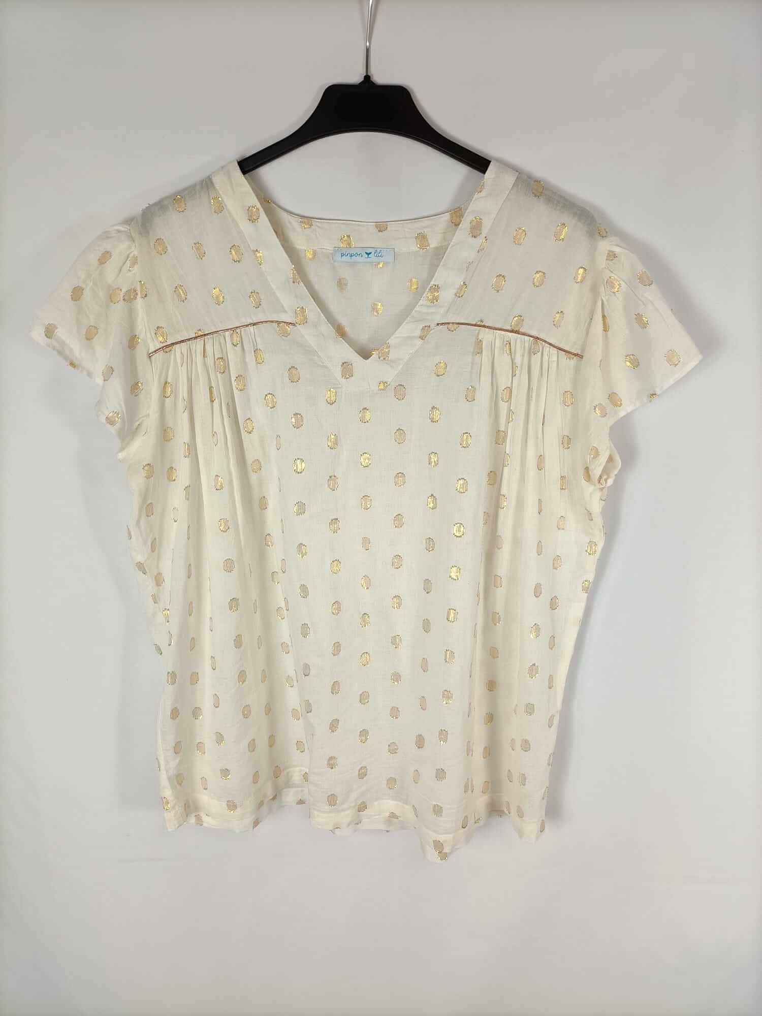 PINPON LILI. Blusa beige con lunares dorados T. u