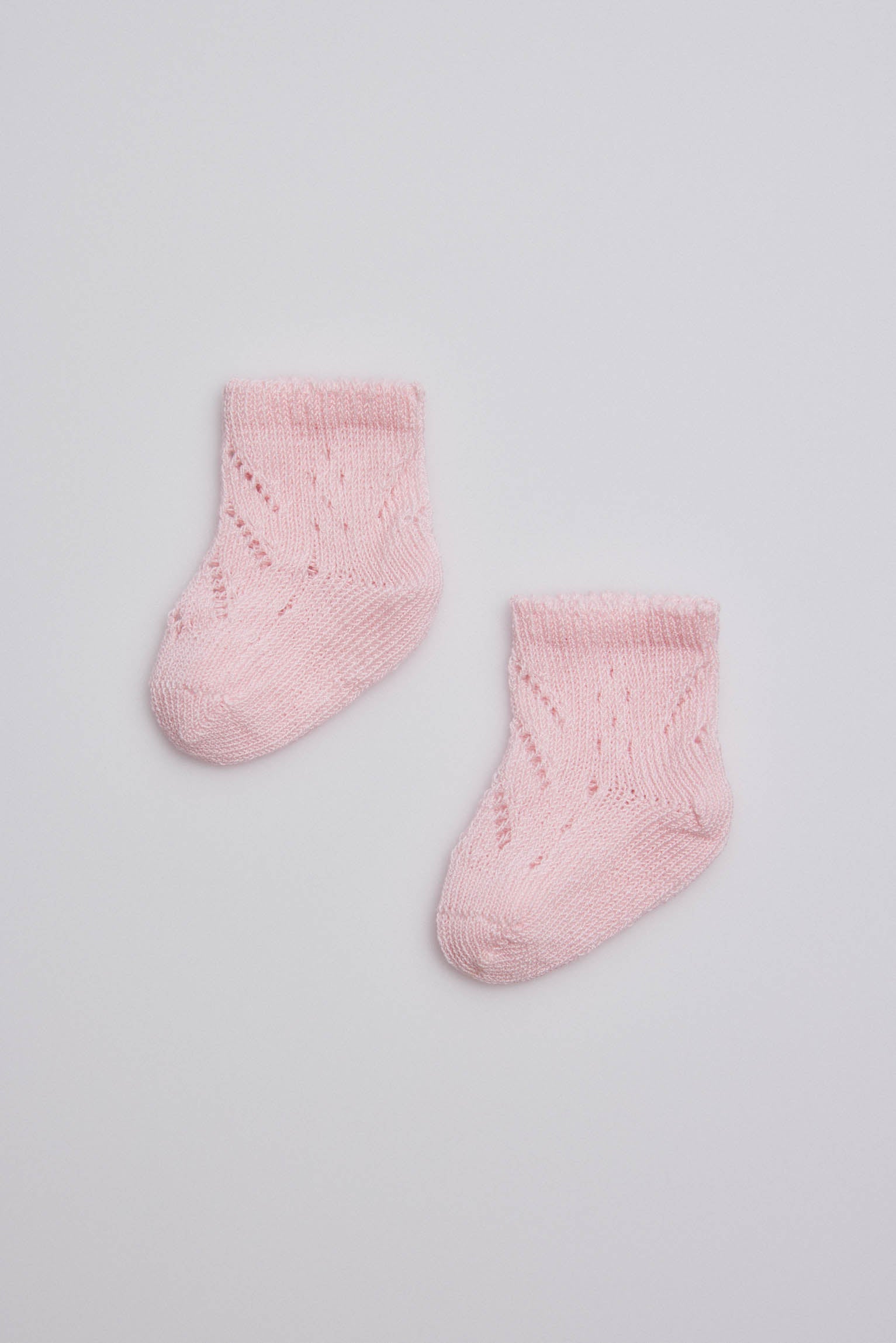 Calcetines perlé recién nacido rosa