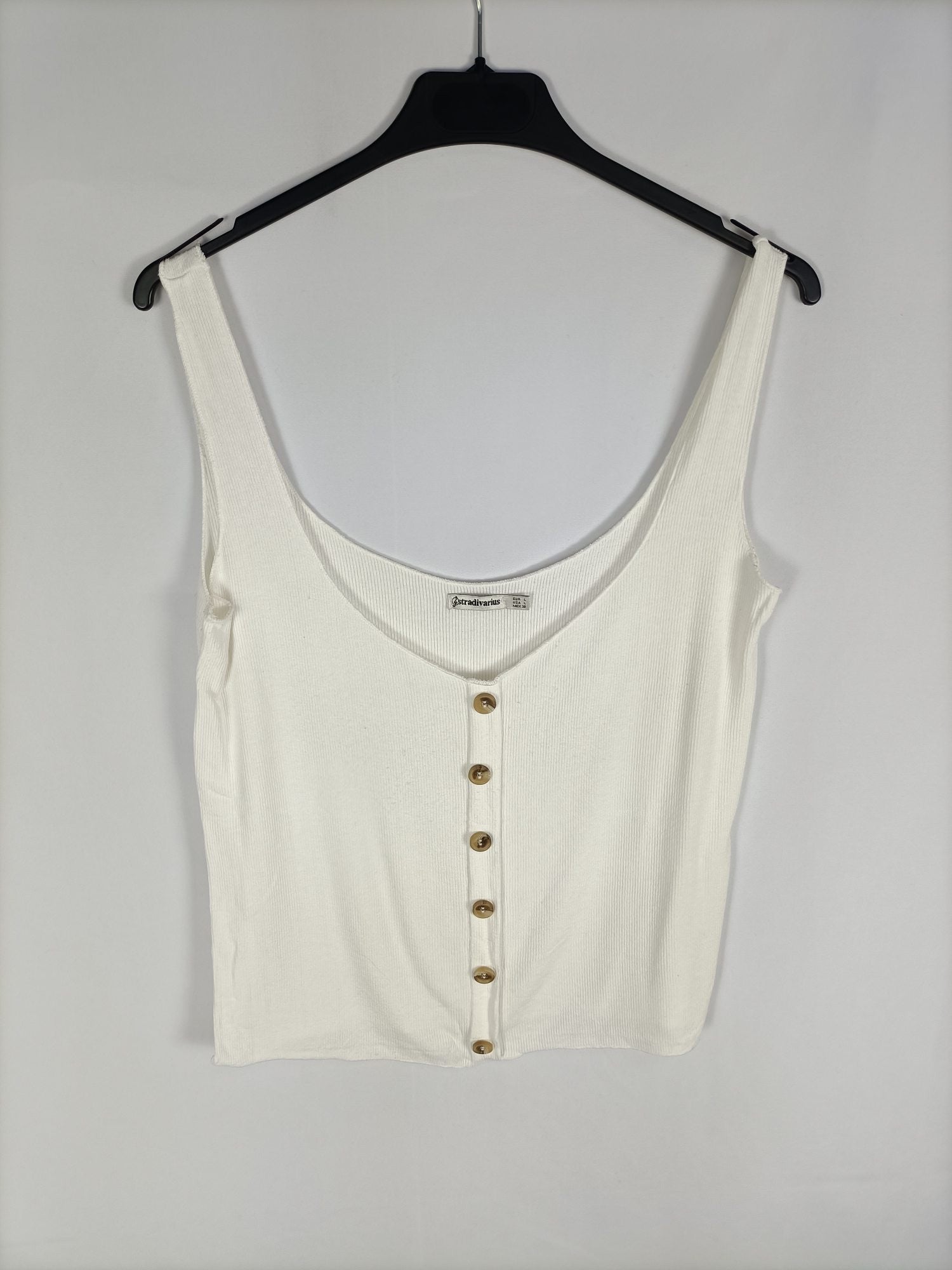 STRADIVARIUS.Top blanco botones T.L