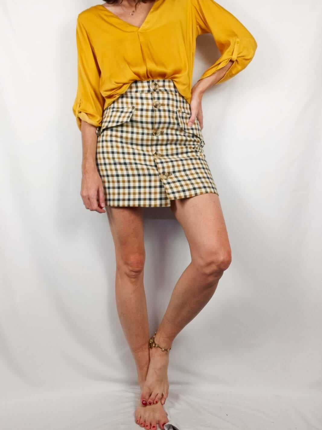 H&M.Falda cuadros botones T.34