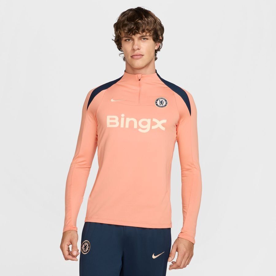 Chelsea Camisa de entrenamiento Dri-FIT Strike Drill - Albaricoque/Obsidiana/Helado de guayaba