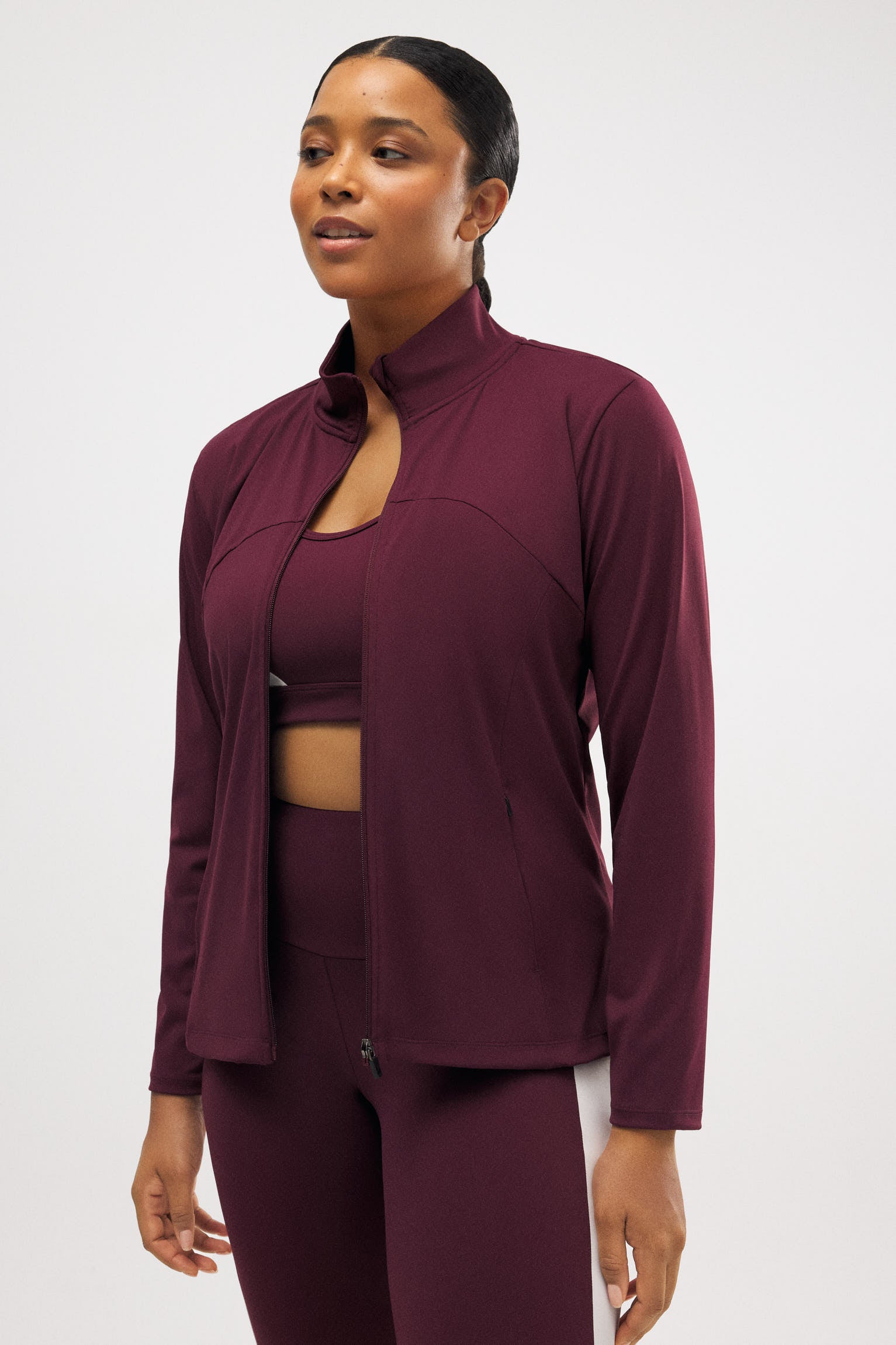 Chaqueta deportiva ajustada transpirable burdeos