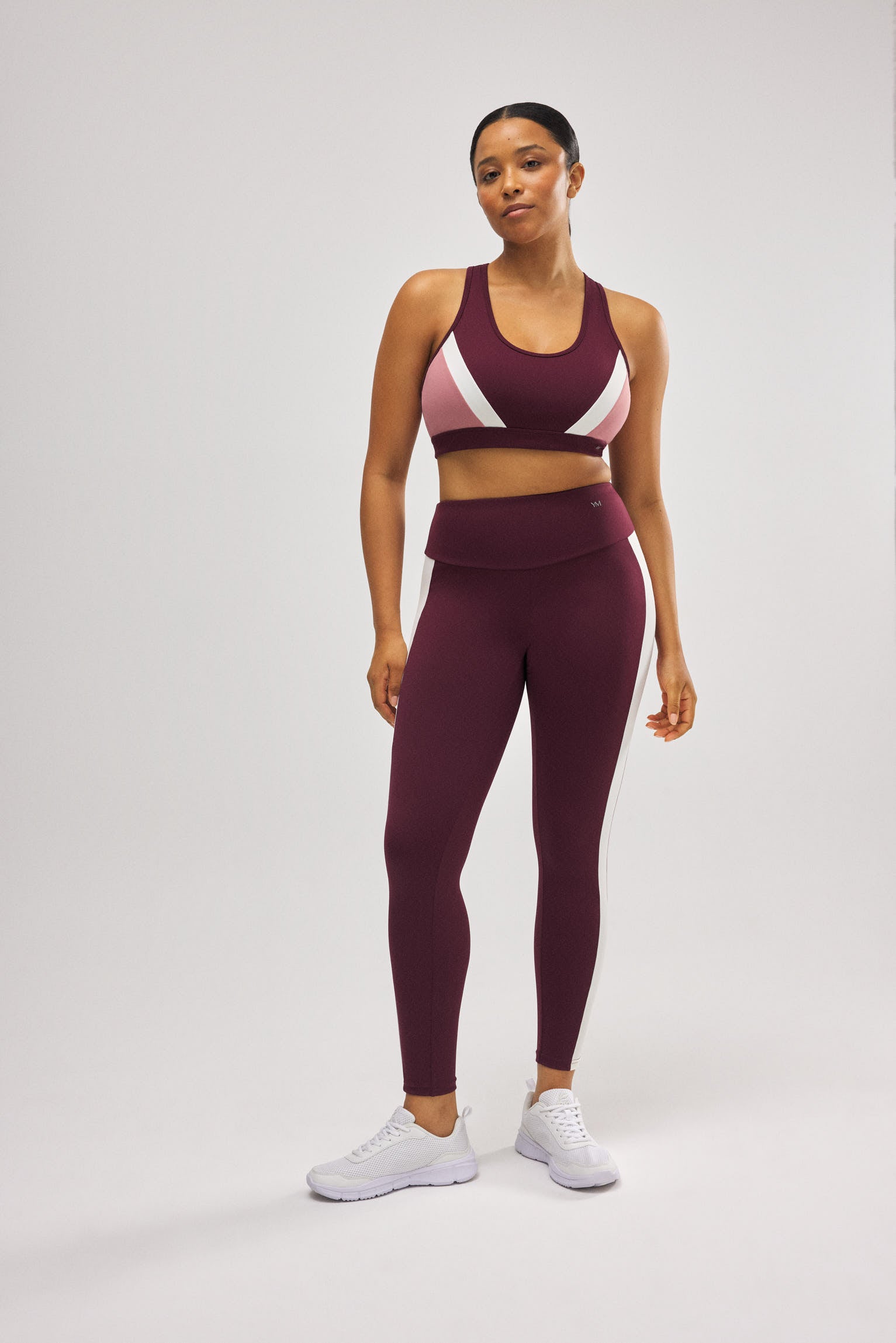 Leggings deportivos color block efecto push-up burdeos