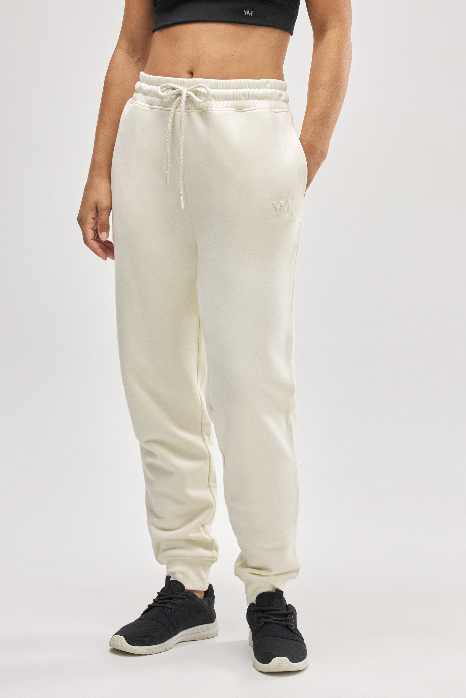 Pantalón jogger deportivo afelpado con cintura ajustable marfil