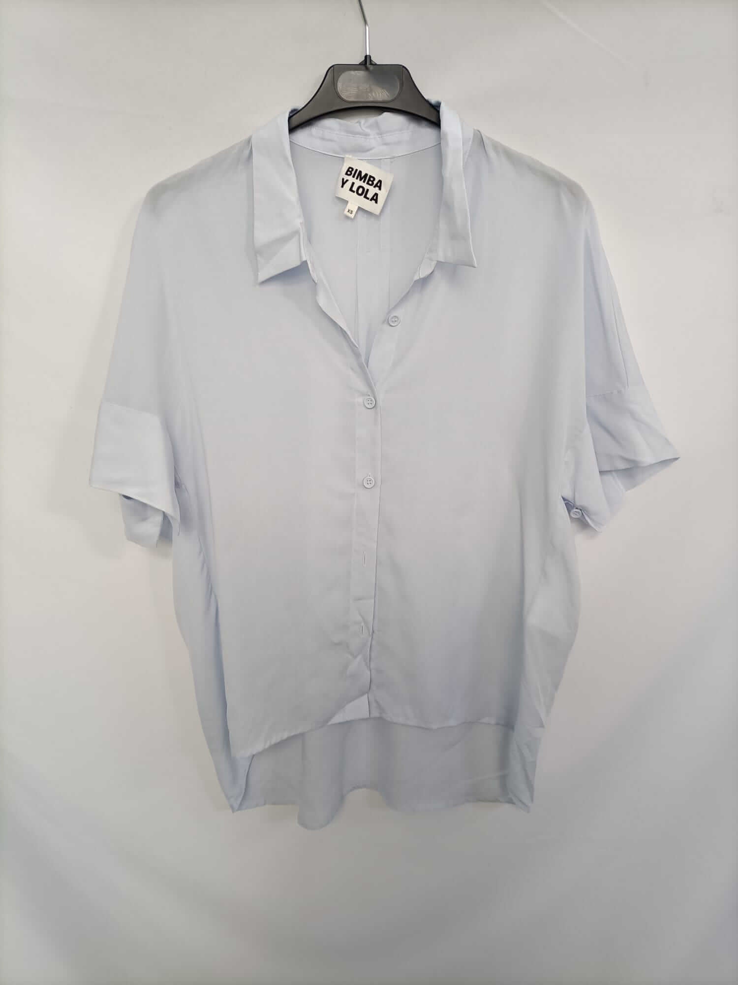 BIMBA Y LOLA. Blusa celeste fluida T.xs