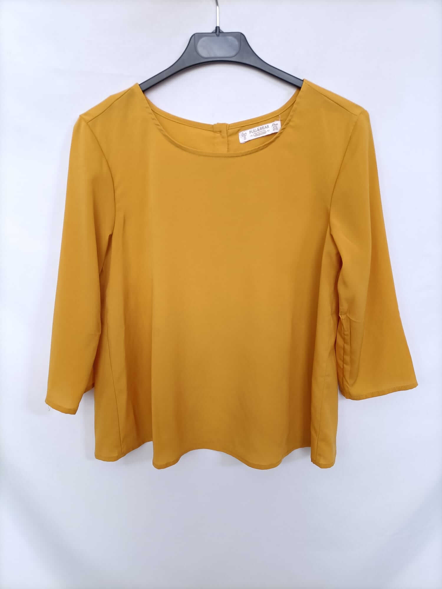 PULL&BEAR. Blusa mostaza botones T.s