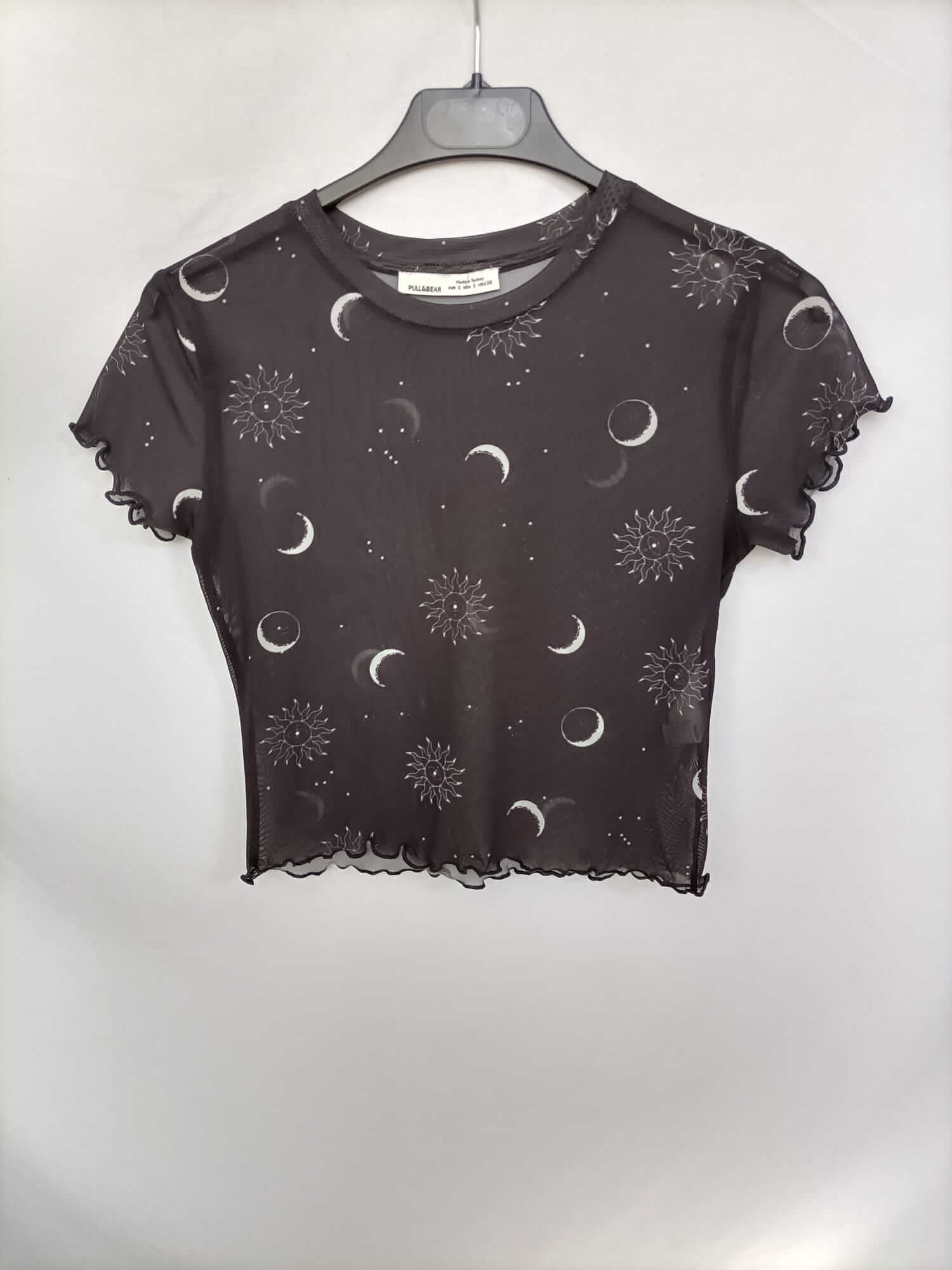 PULL&BEAR. Top rejilla lunas y soles T.s