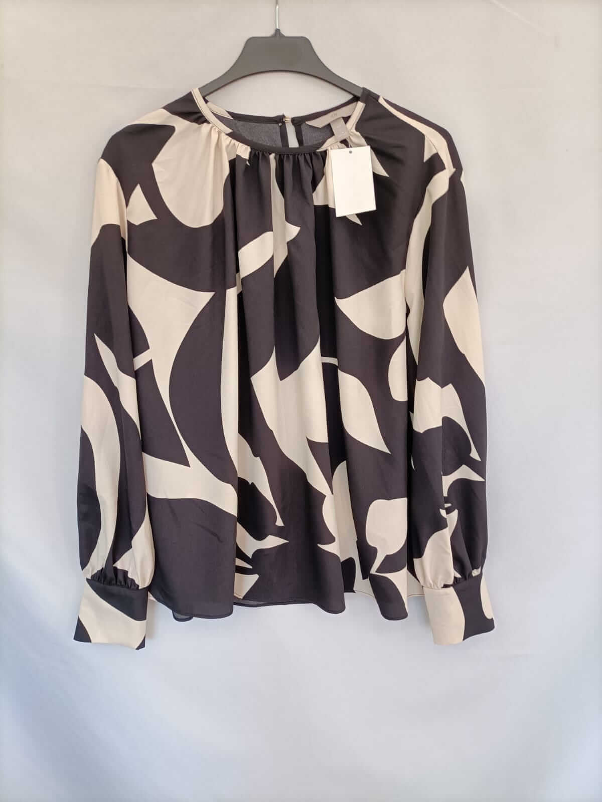 H&M.Blusa bicolor T.XL