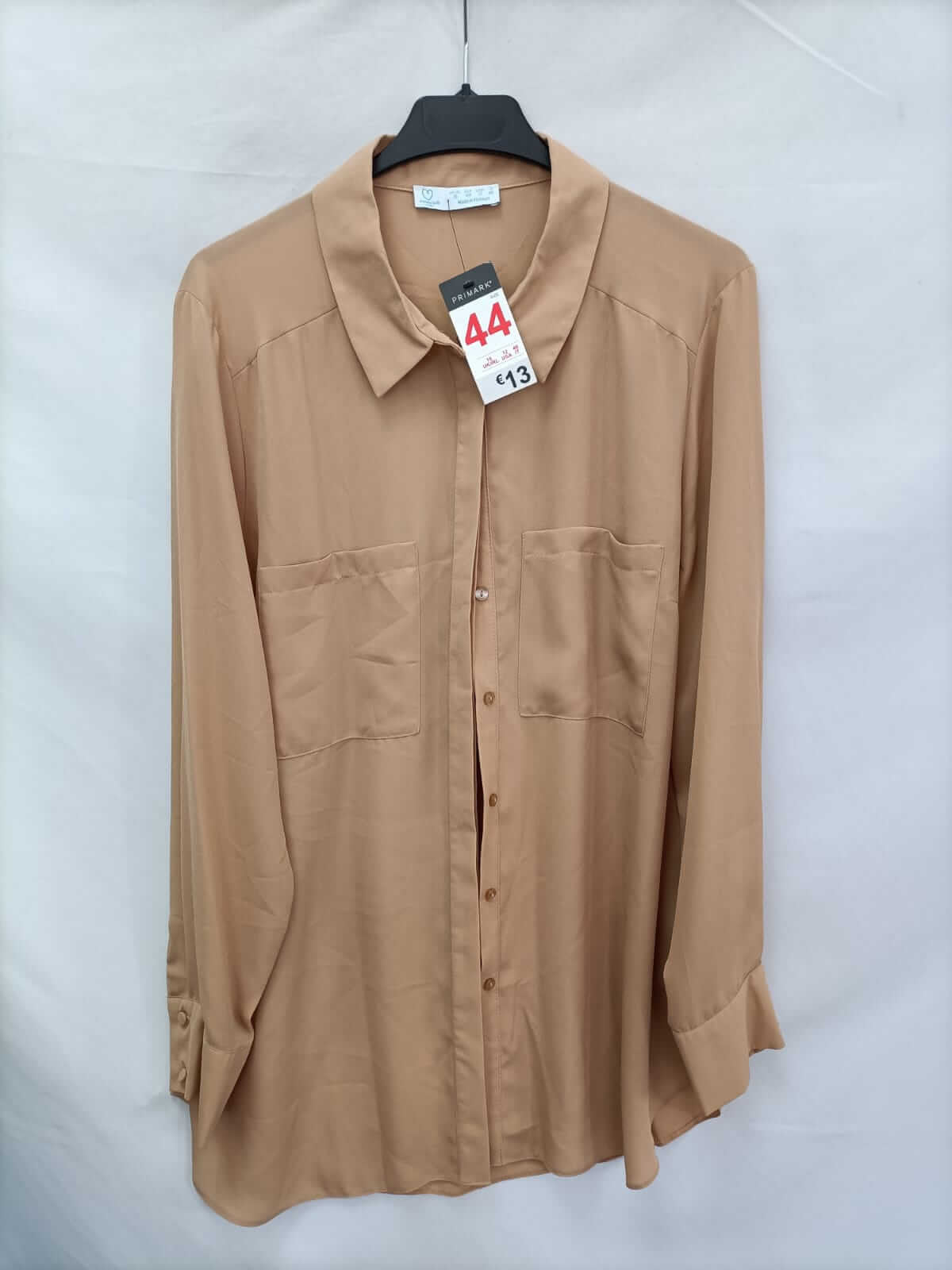 PRIMARK.Blusa maquillaje T.44