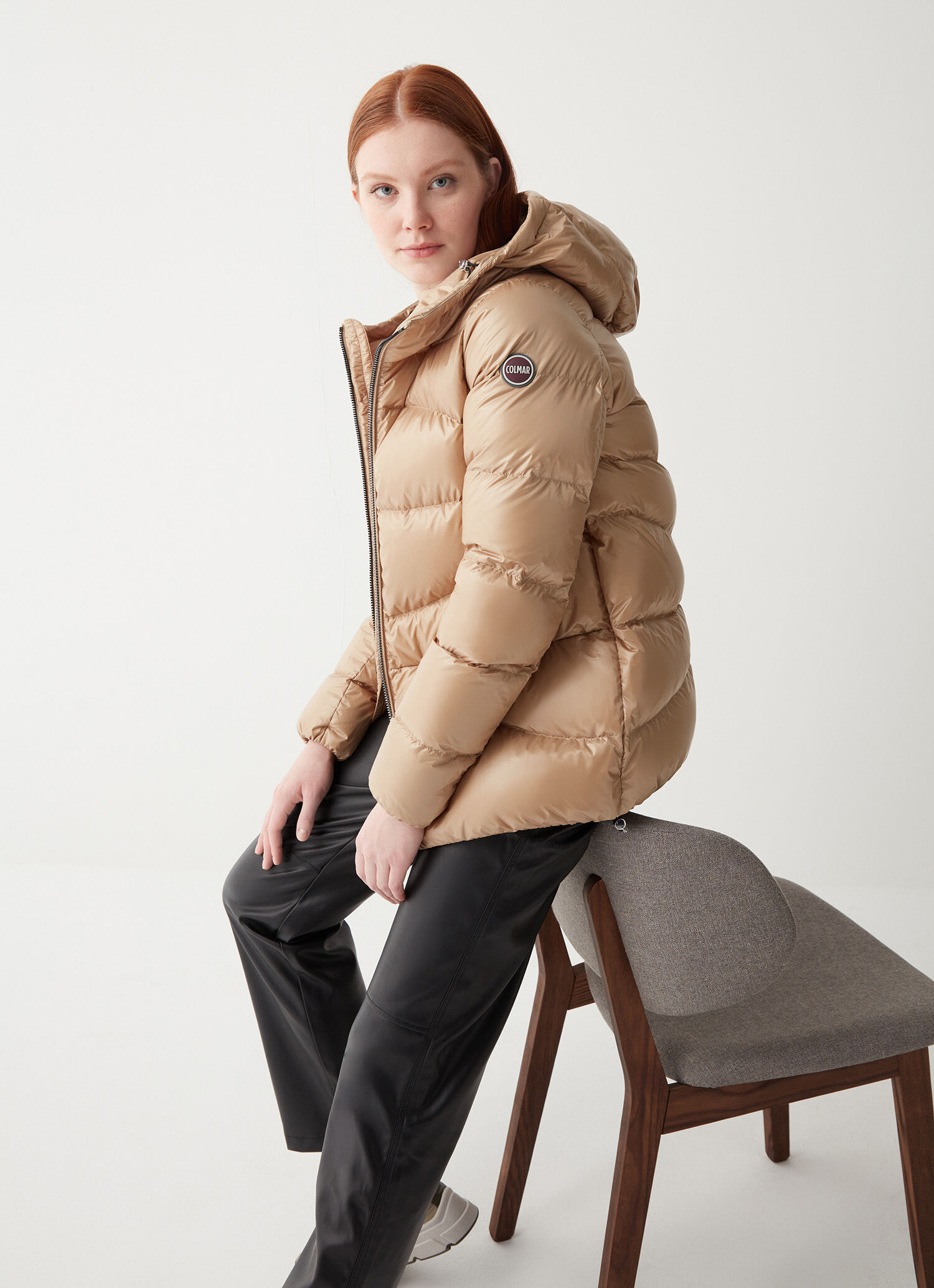 Plumífero con puños y bajo elásticos