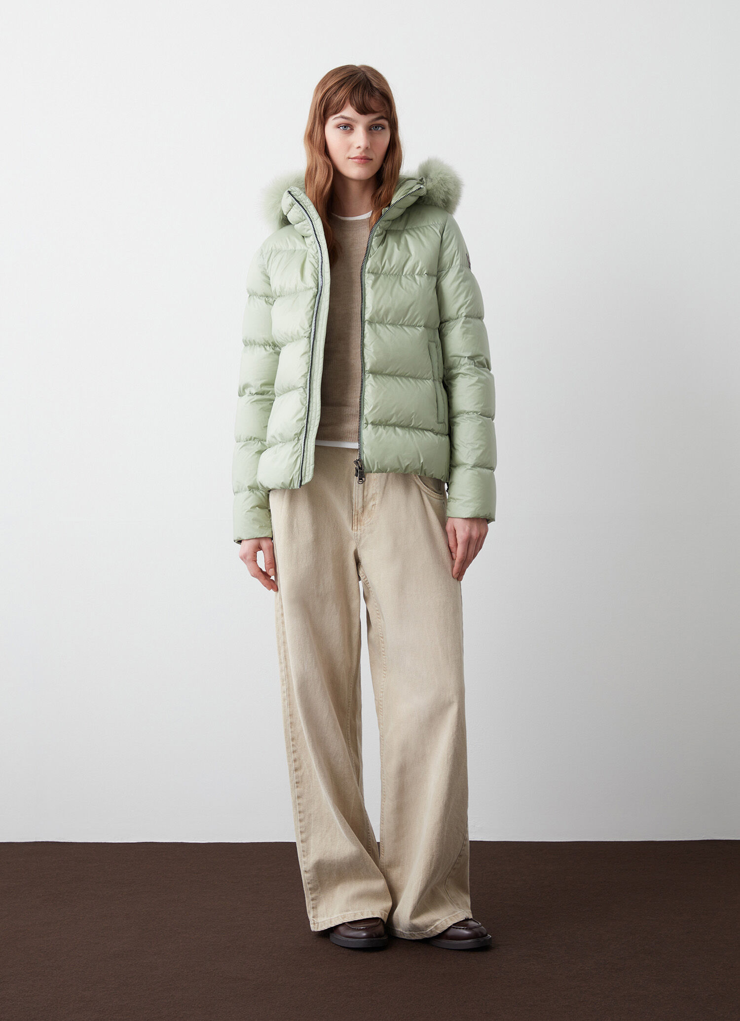 Plumífero con capucha desmontable de pelo sintético