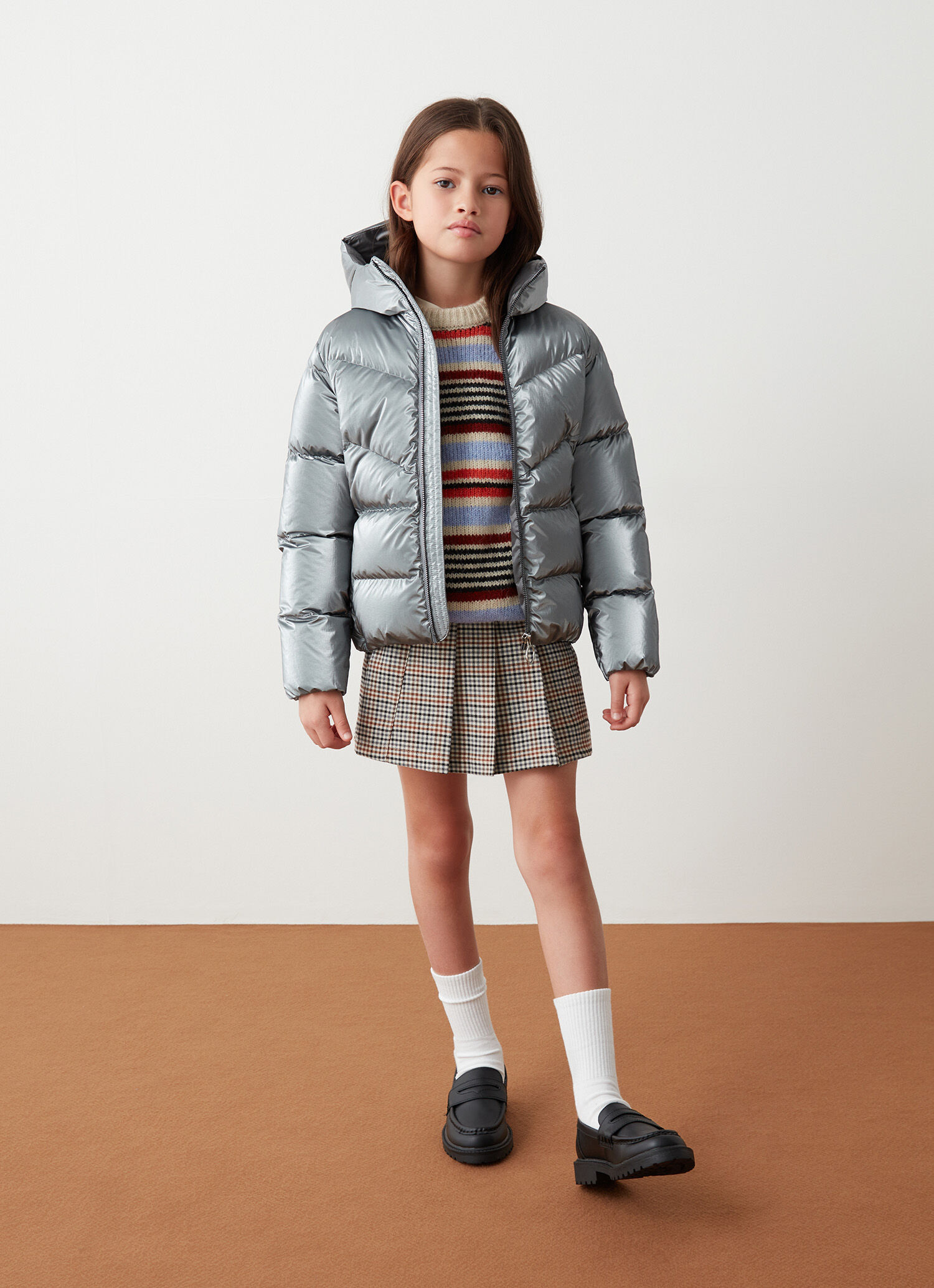 Plumífero plateado efecto metalizado