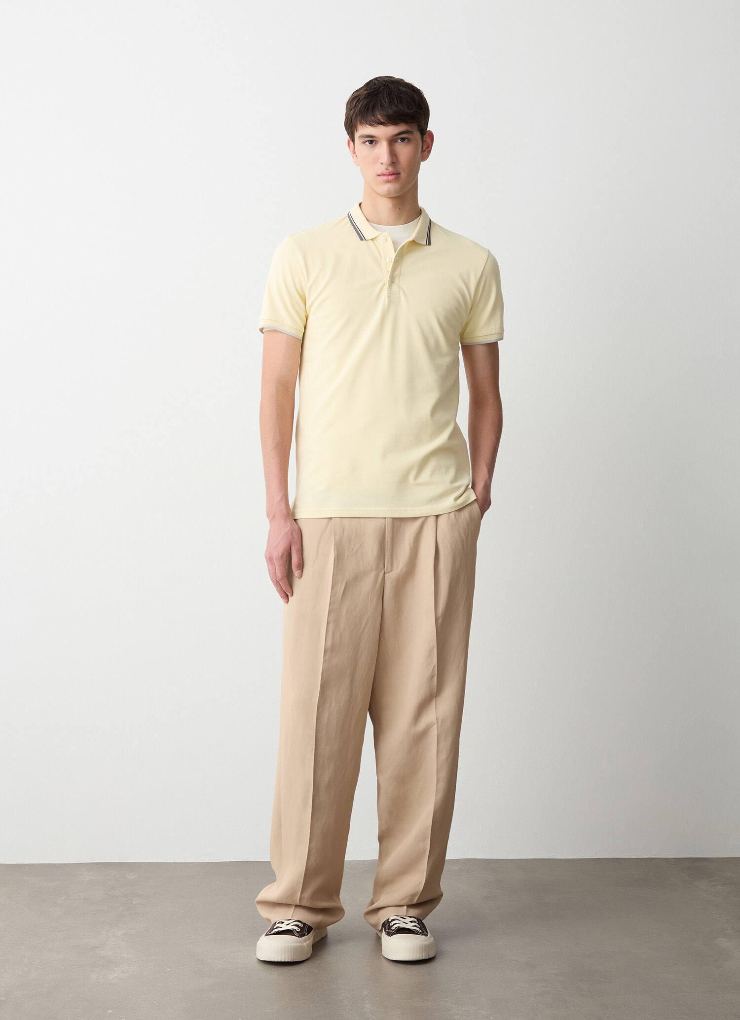 Polo de piqué con rayas