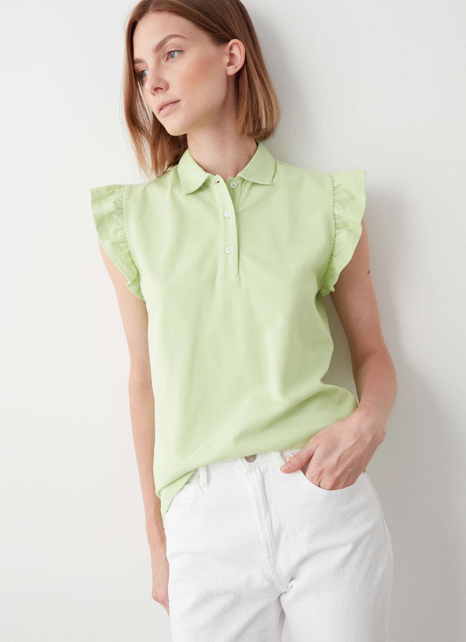 Polo de piqué con volantes