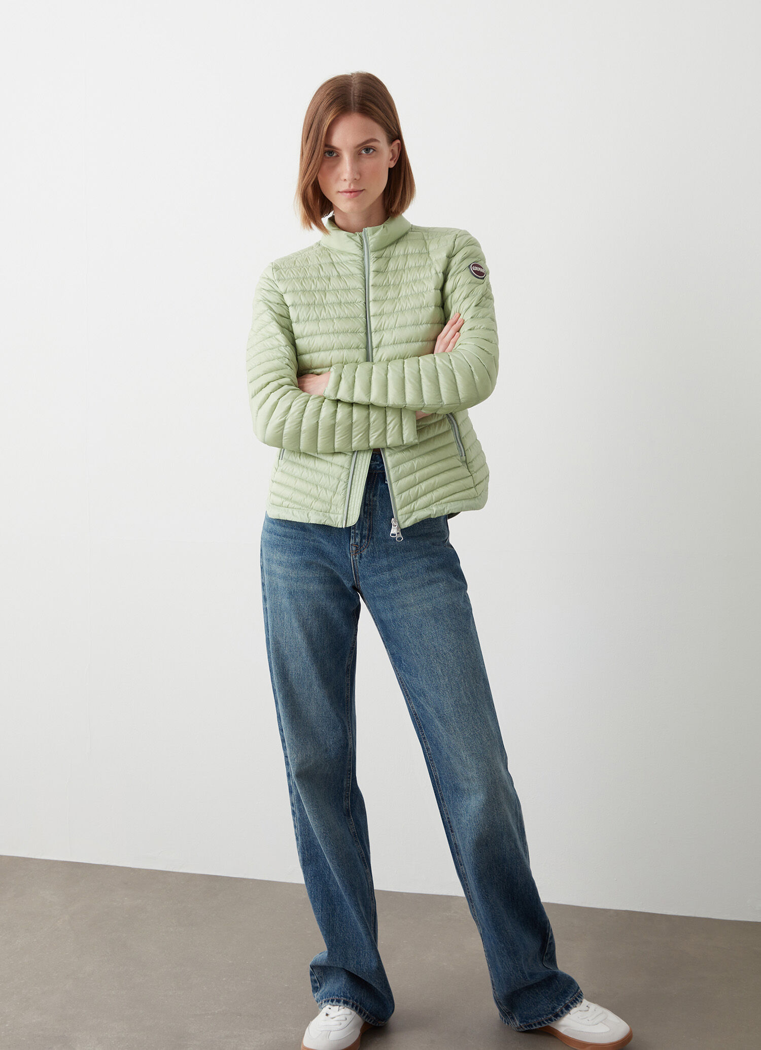 Plumífero con bajo redondeado