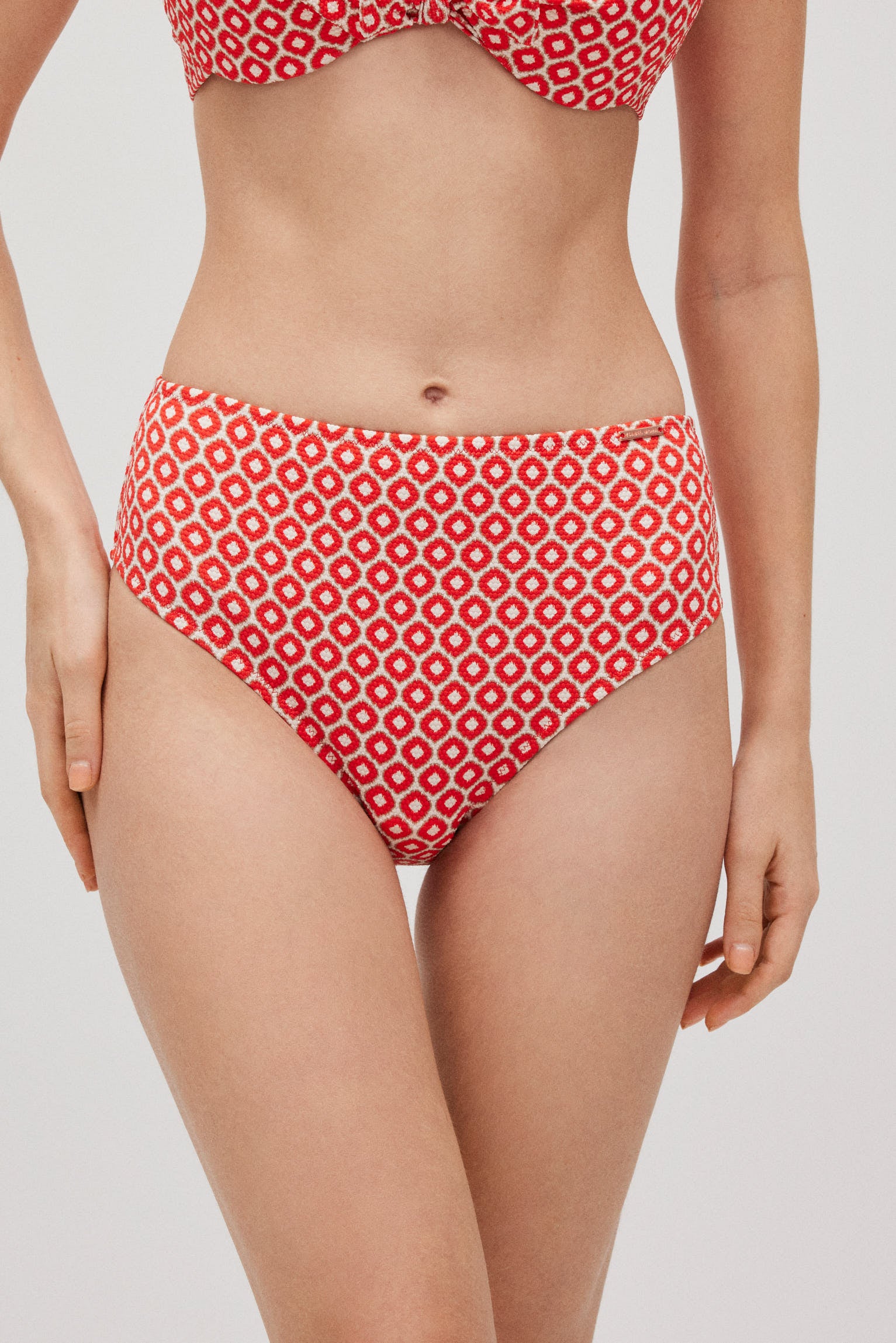 Braga bikini moldeadora alta estampada piqué