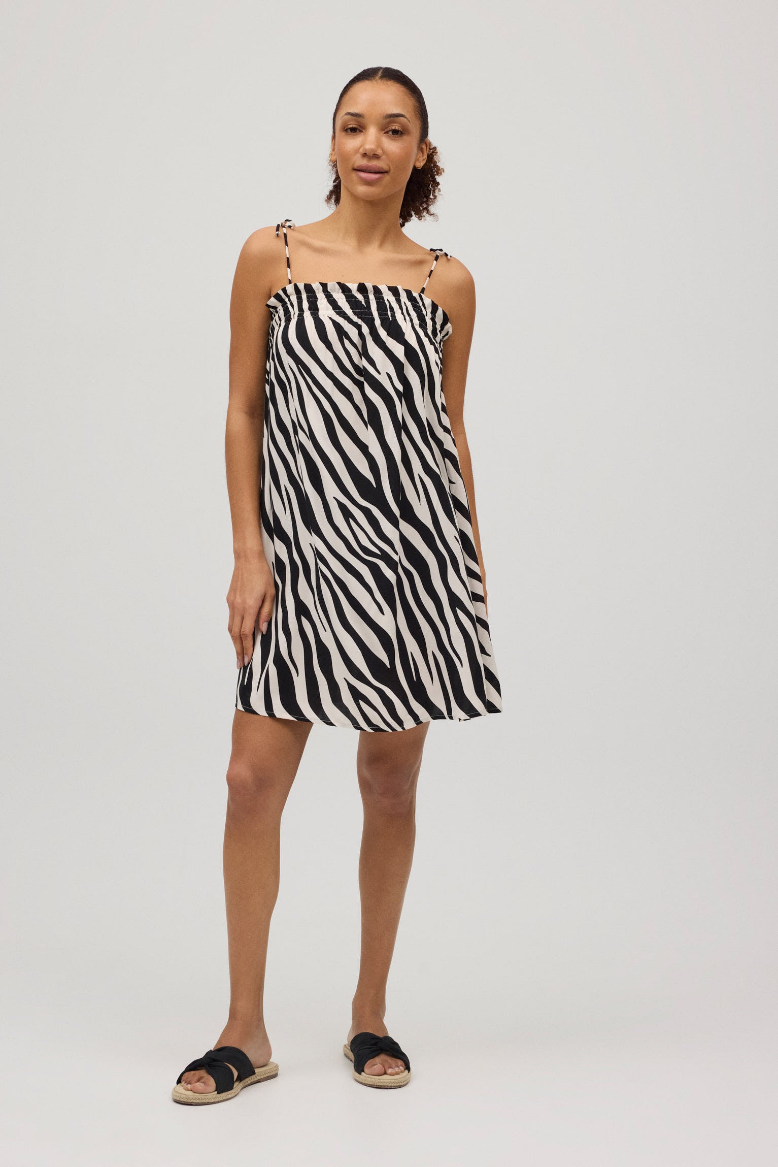 Vestido corto tirantes anudados animal print