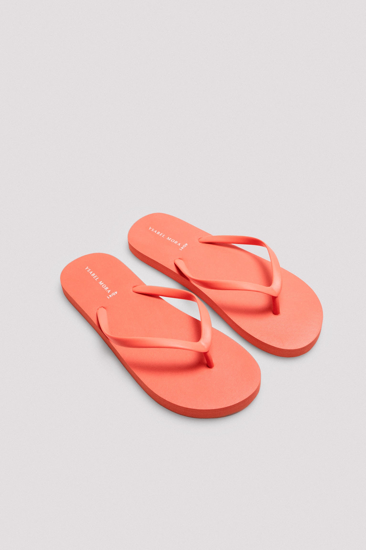 Chanclas de playa de dedo básicas coral