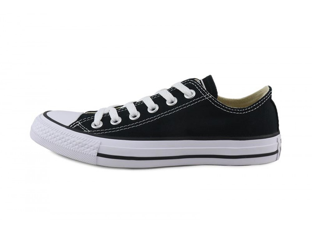 Zapatilla de lona negra y suela blanca con cordón Converse