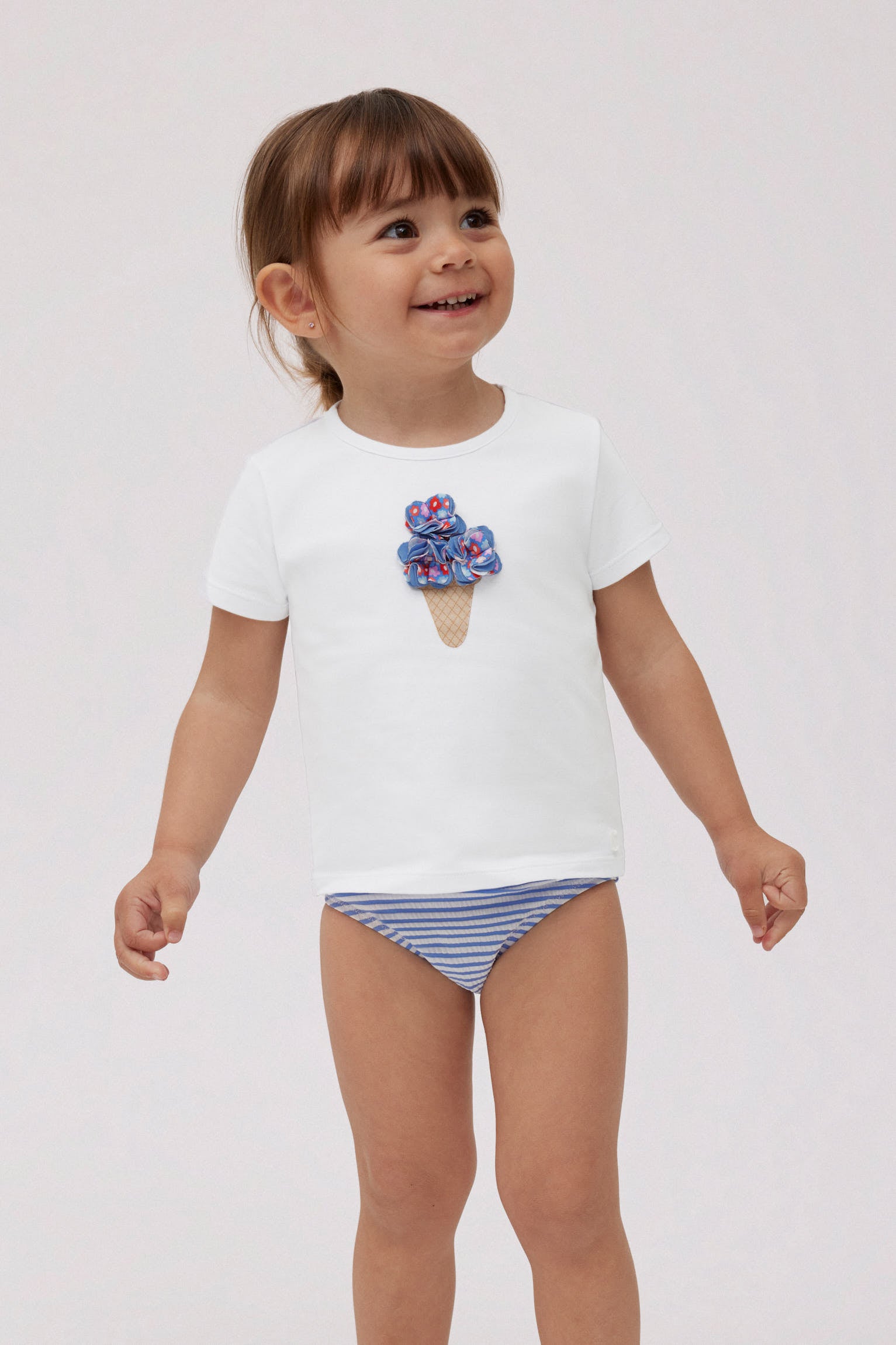 Set bebé bañador culetín rayas azules con textura y camiseta