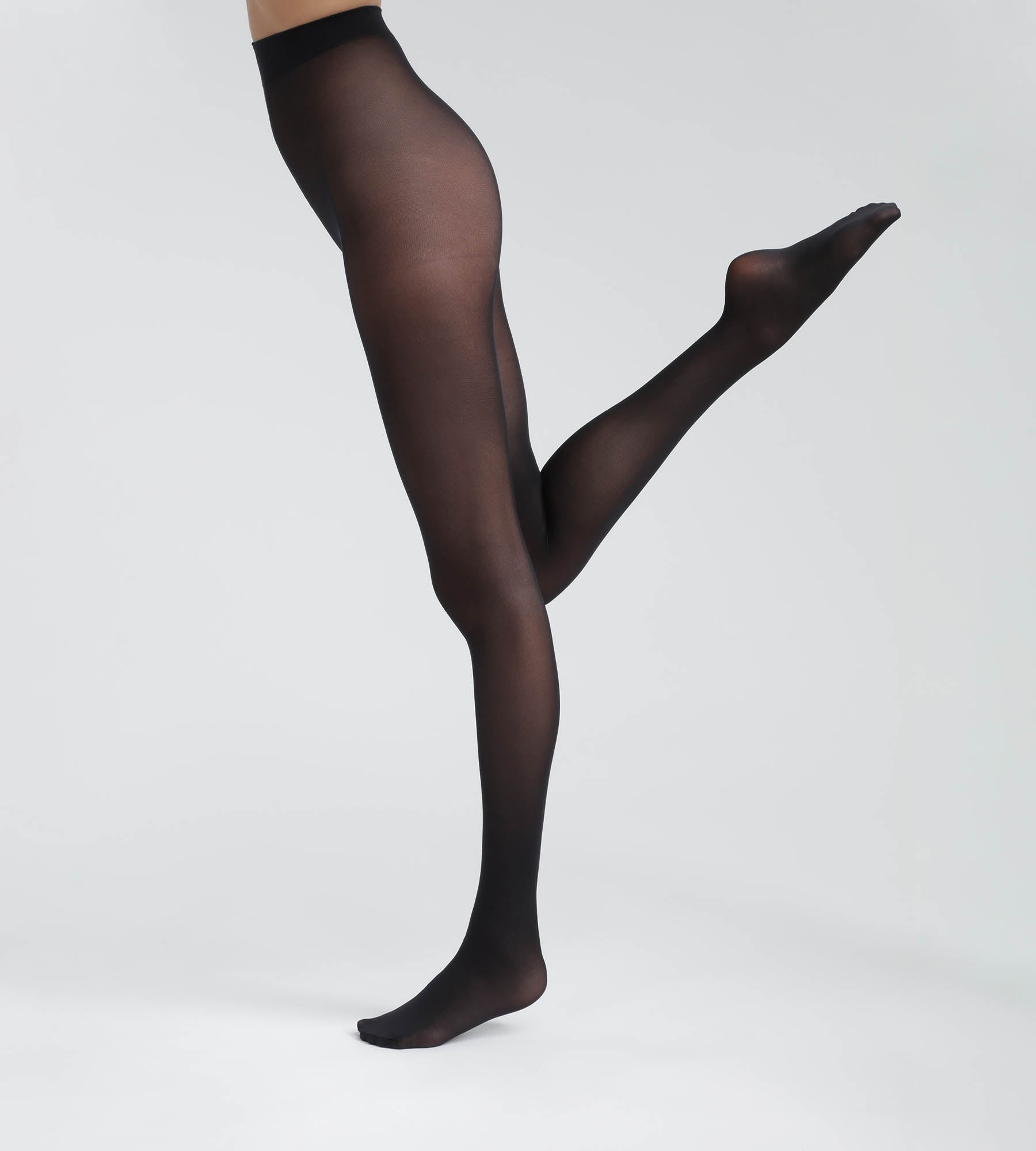 Opaque 50 denier black tights made from recycled yarns Dim Good
