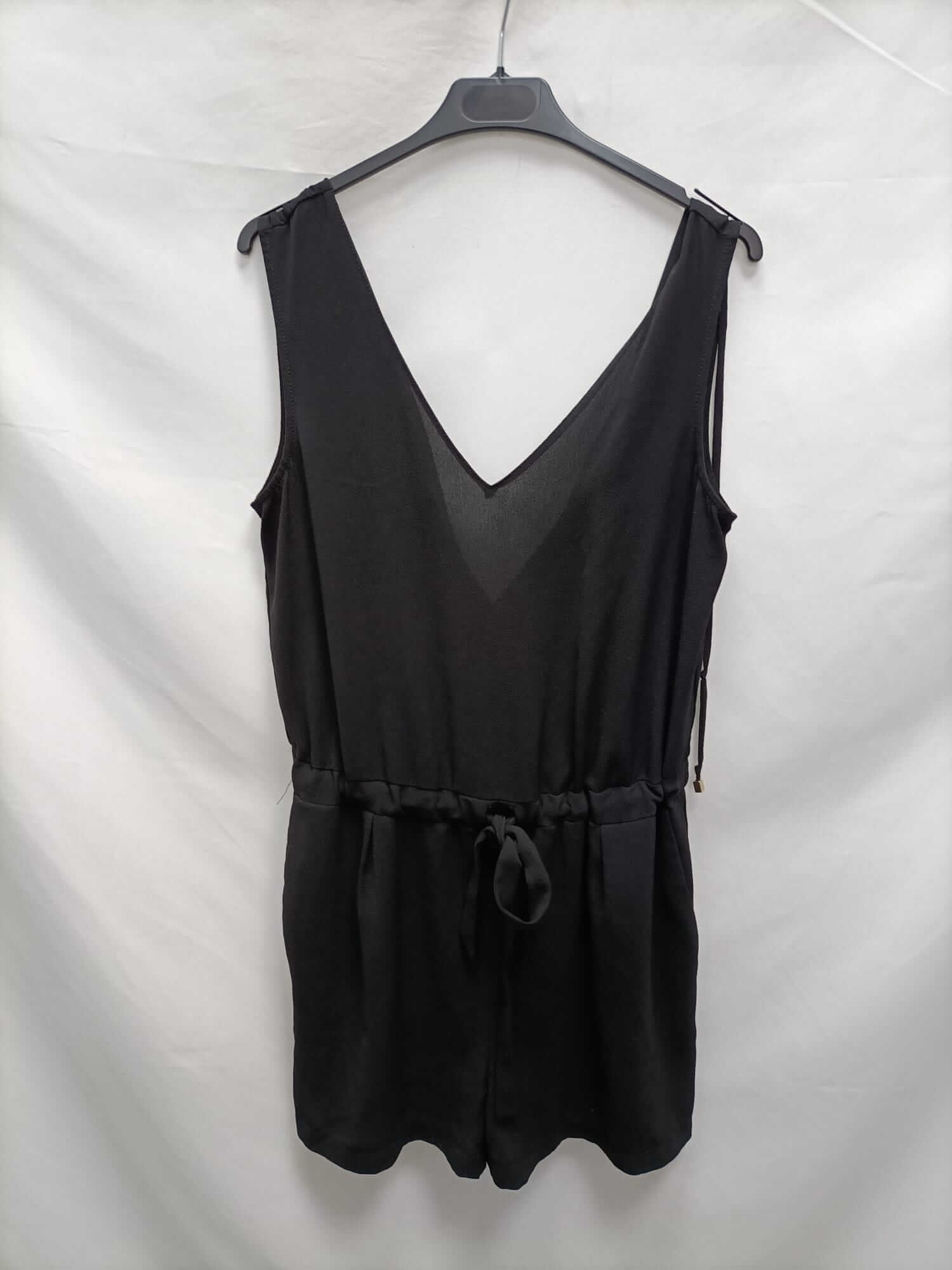 ZARA.Mono negro corto T.s