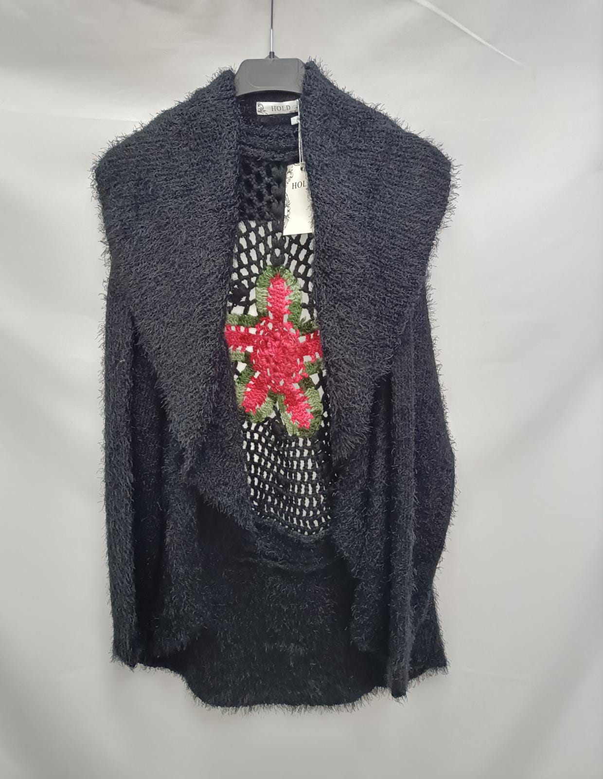 HOLD.Cárdigan negro pelito T.L