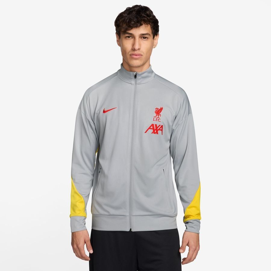 Liverpool Chaqueta de chándal Dri-FIT Academy Profesional 3. - Gris ahumado/Amarillo cromado/Global Red