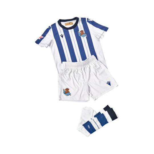 Conjunto Macron Real Sociedad Primera Equipación 2025-2026 Niño White-Blue