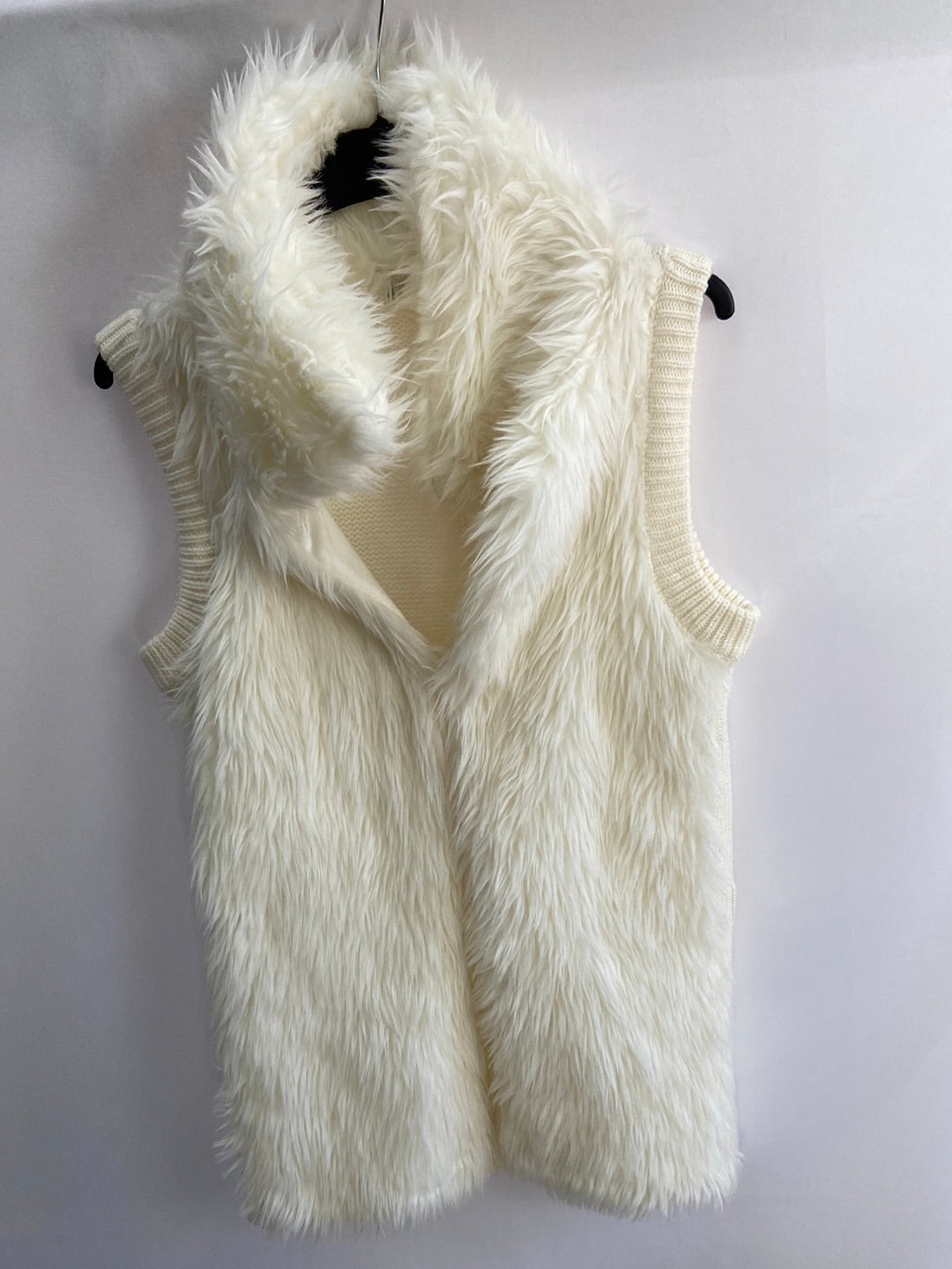 OTRAS.Chaleco blanco roto pelo y punto T.M