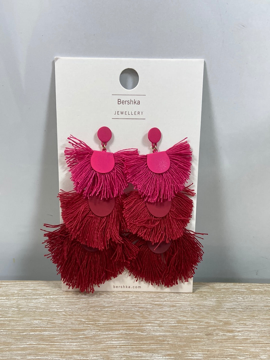 BERSHKA.Pendientes maxi flecos